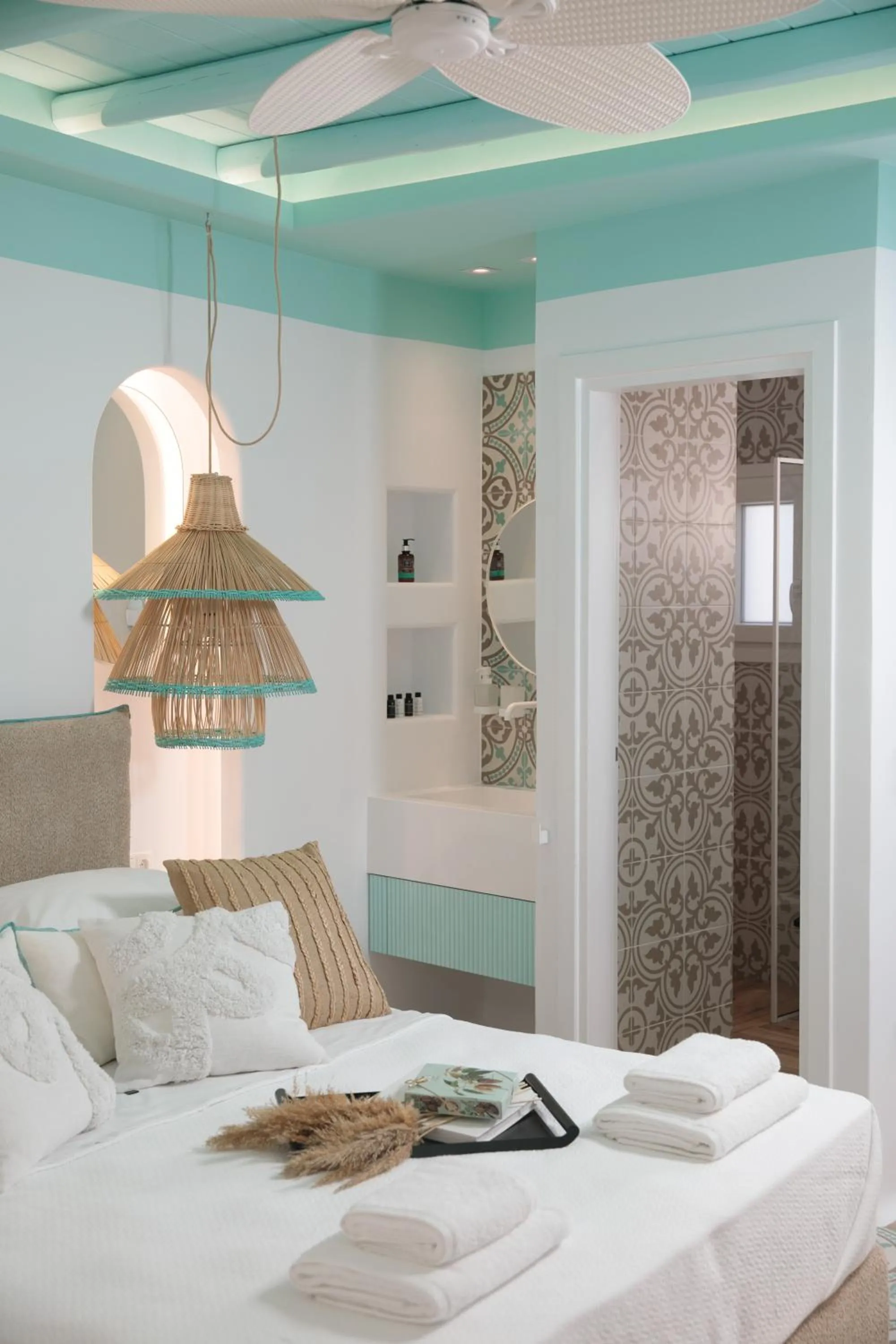 Bed in Flora Apartments & Studios
