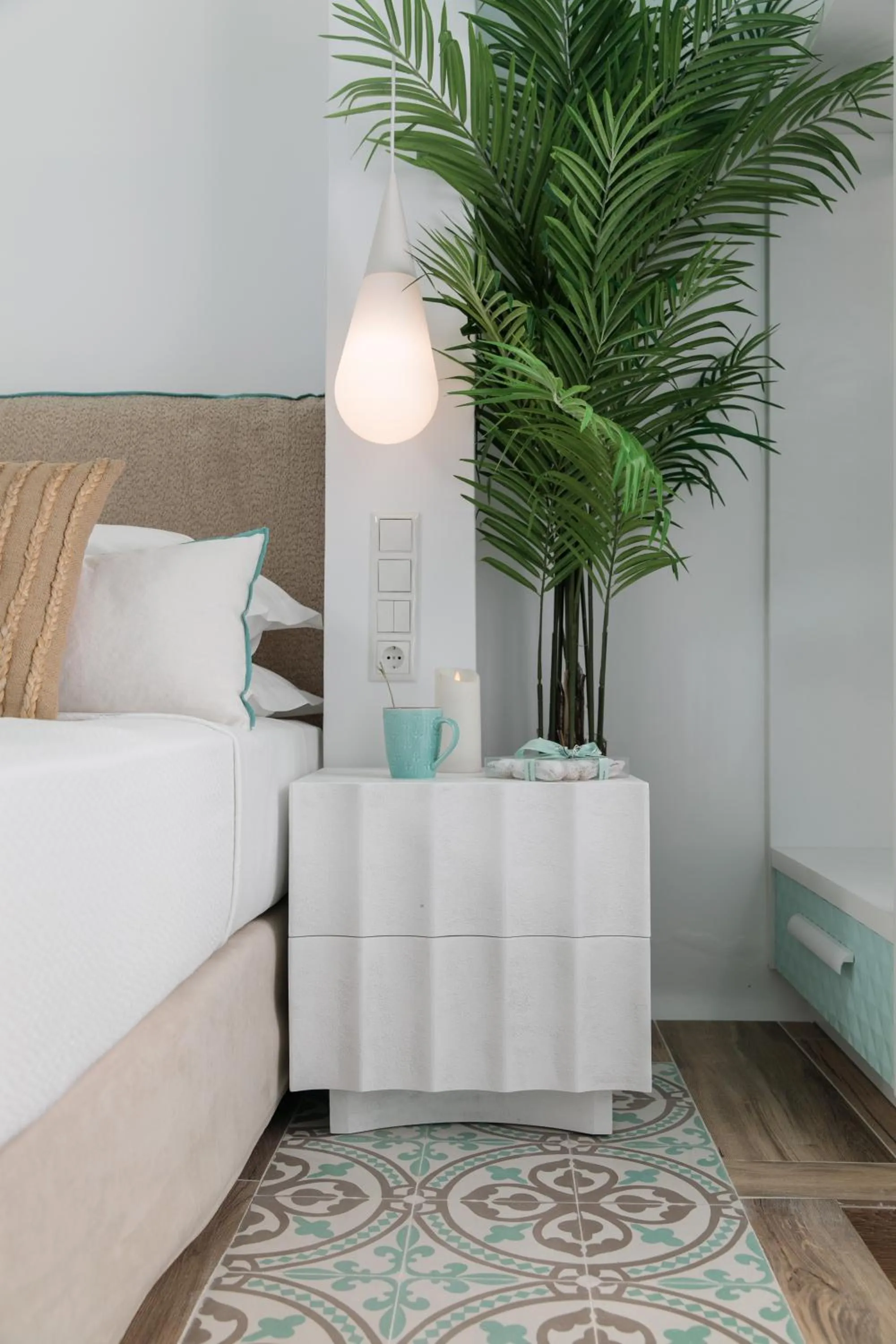 Bed in Flora Apartments & Studios
