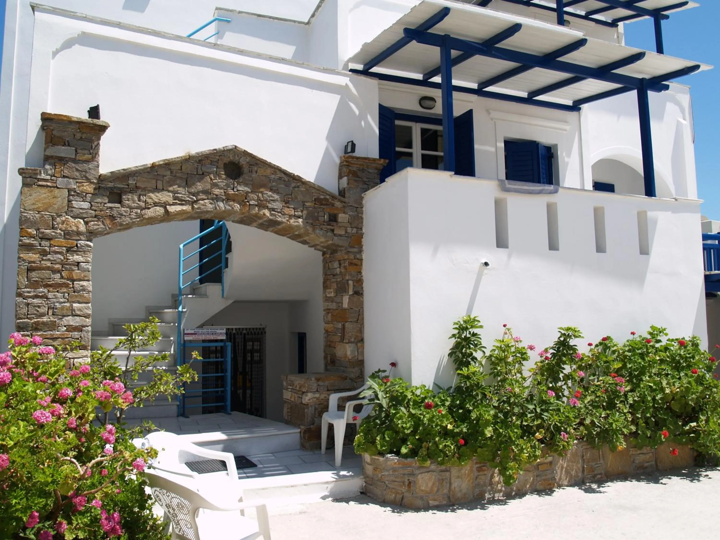 Facade/entrance in Flora Apartments & Studios
