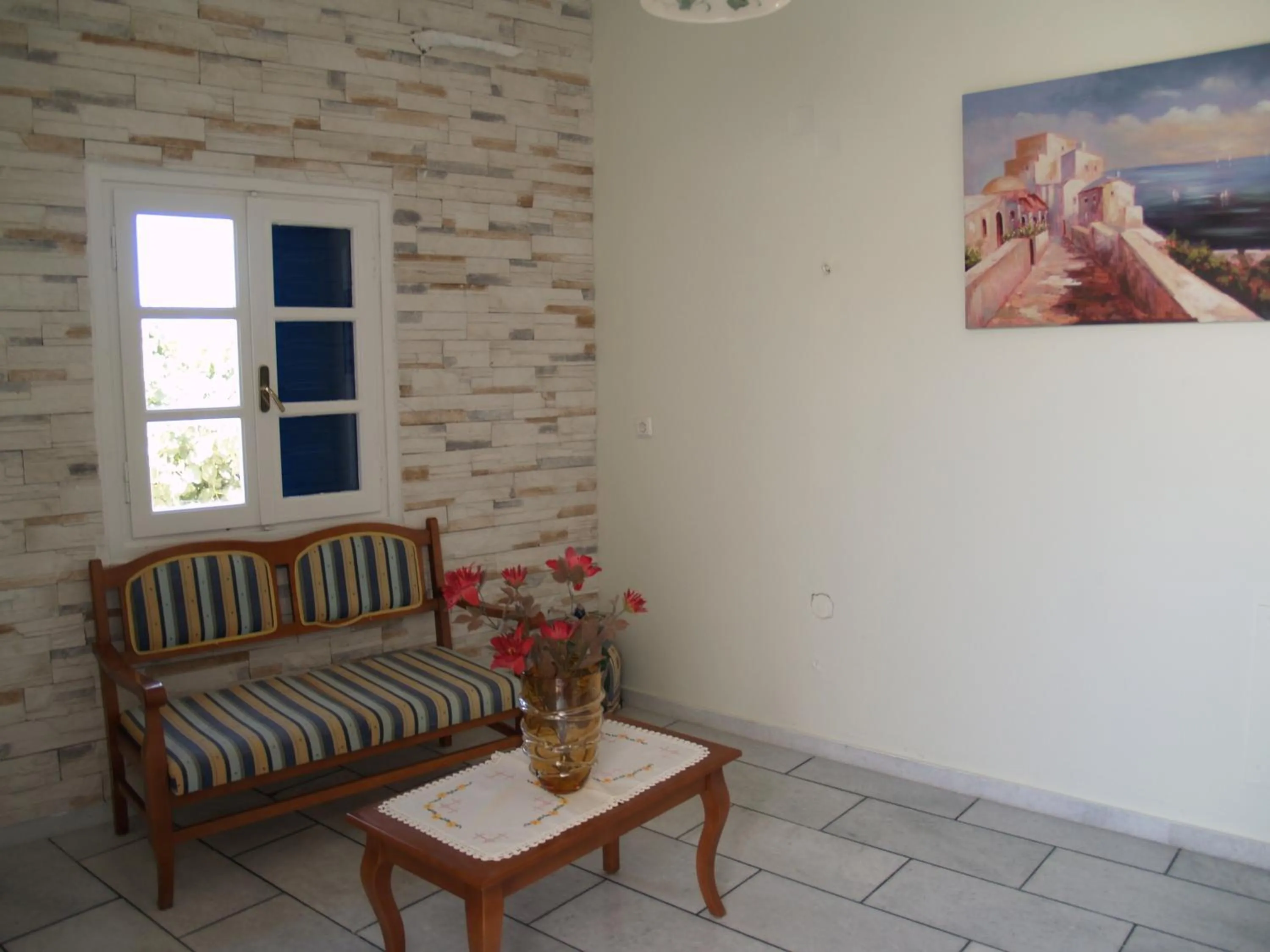 Seating area in Flora Apartments & Studios