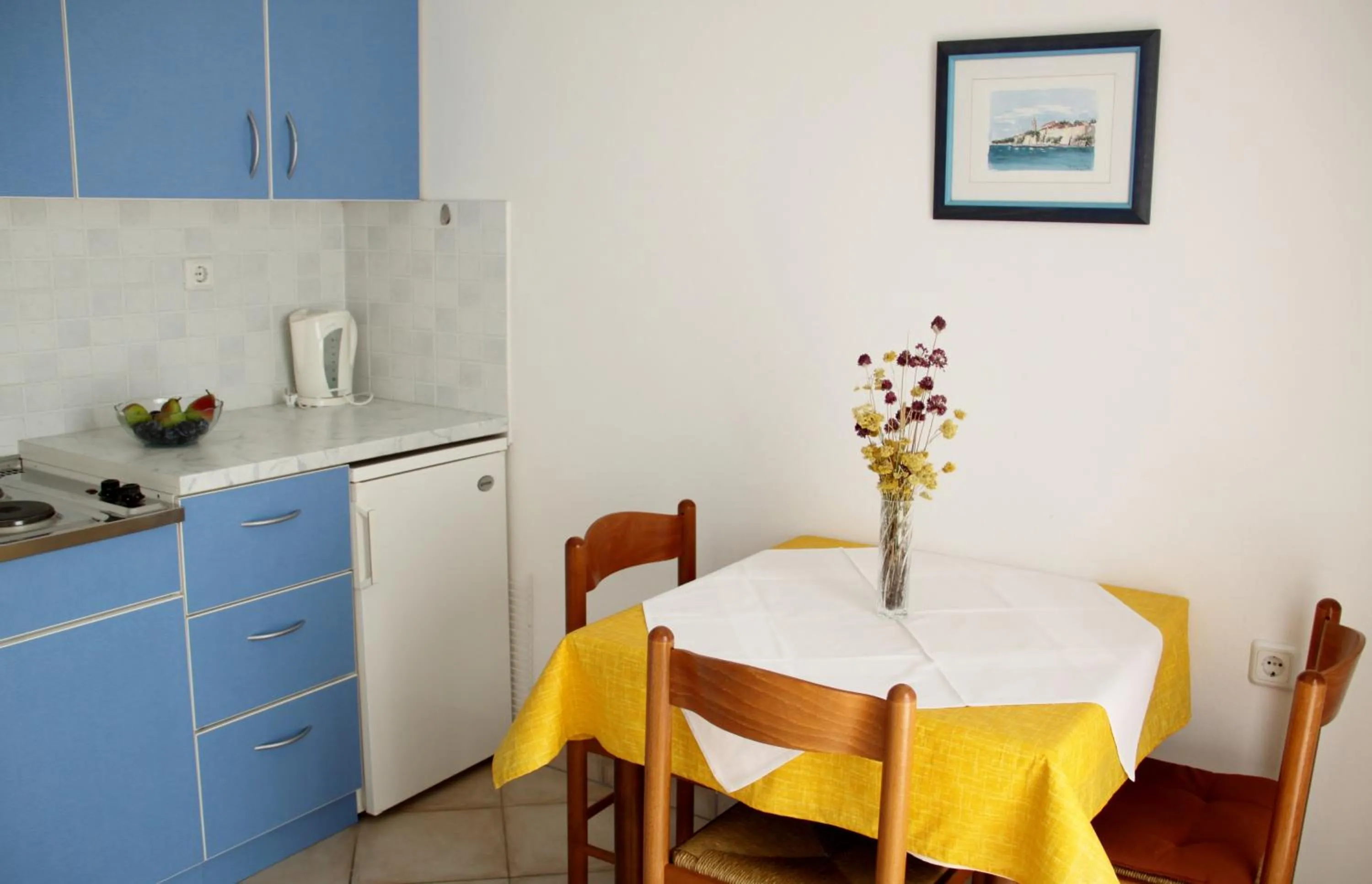 Kitchen or kitchenette in Apartments Čuljak Rab