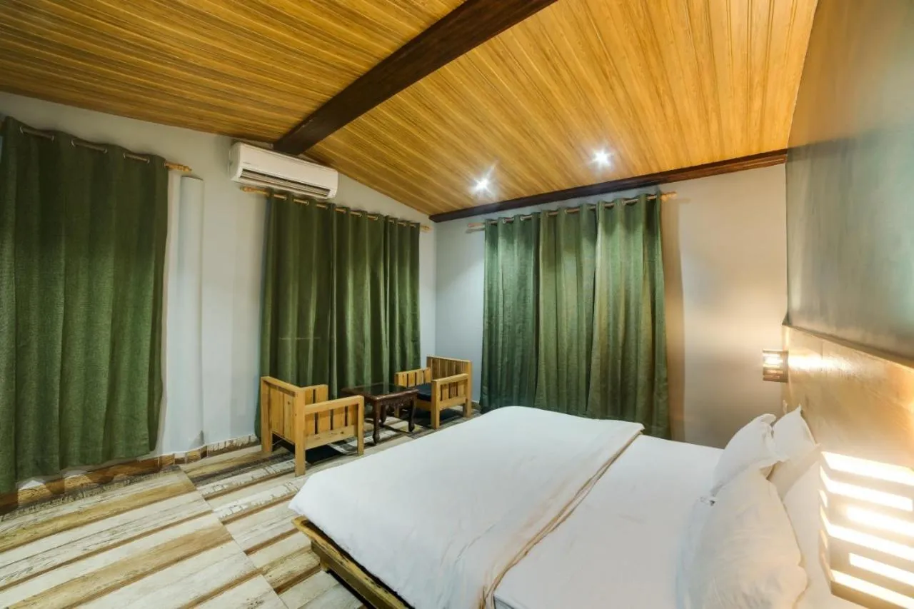 Photo of the whole room, Bed in Hill Top Swiss Cottage