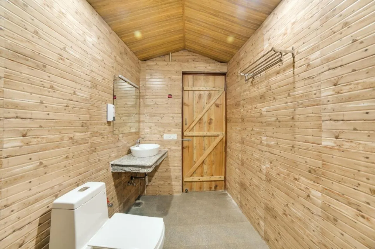 Toilet in Hill Top Swiss Cottage