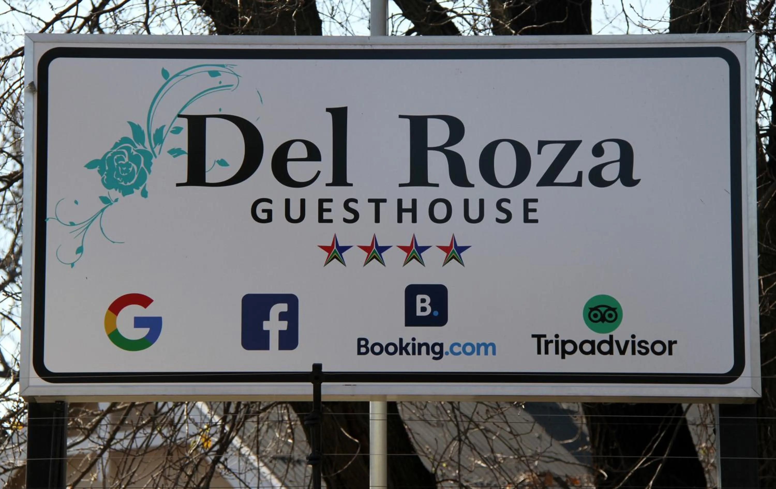 Property logo or sign in Del Roza Guest House