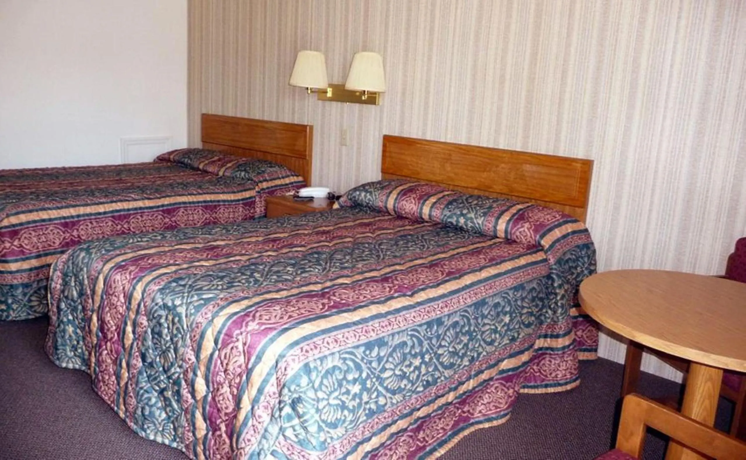 Bed in Red Rose Motel