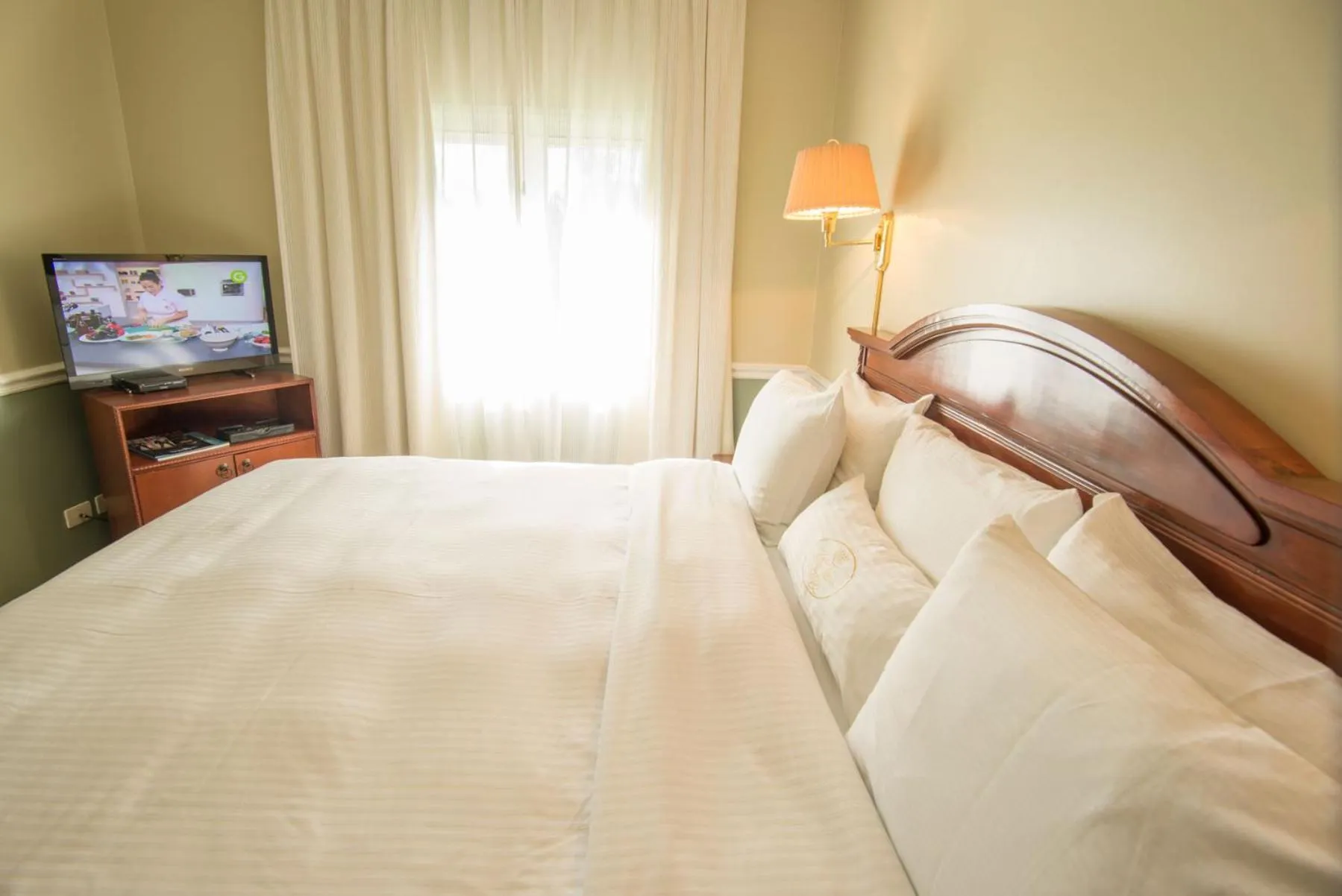 Bed in Hotel Villa Morra Suites