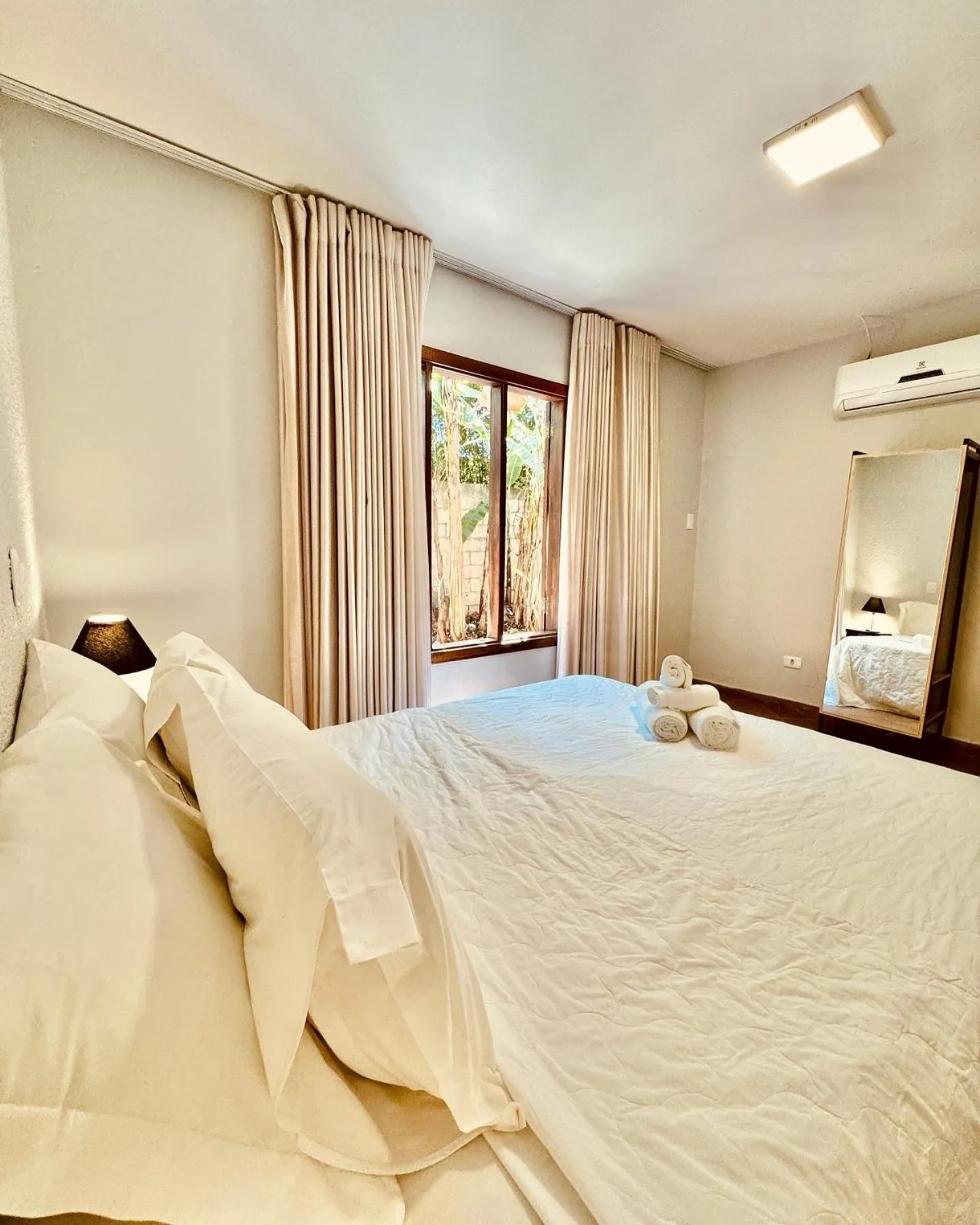 Bed in Pousada Casa das Flores
