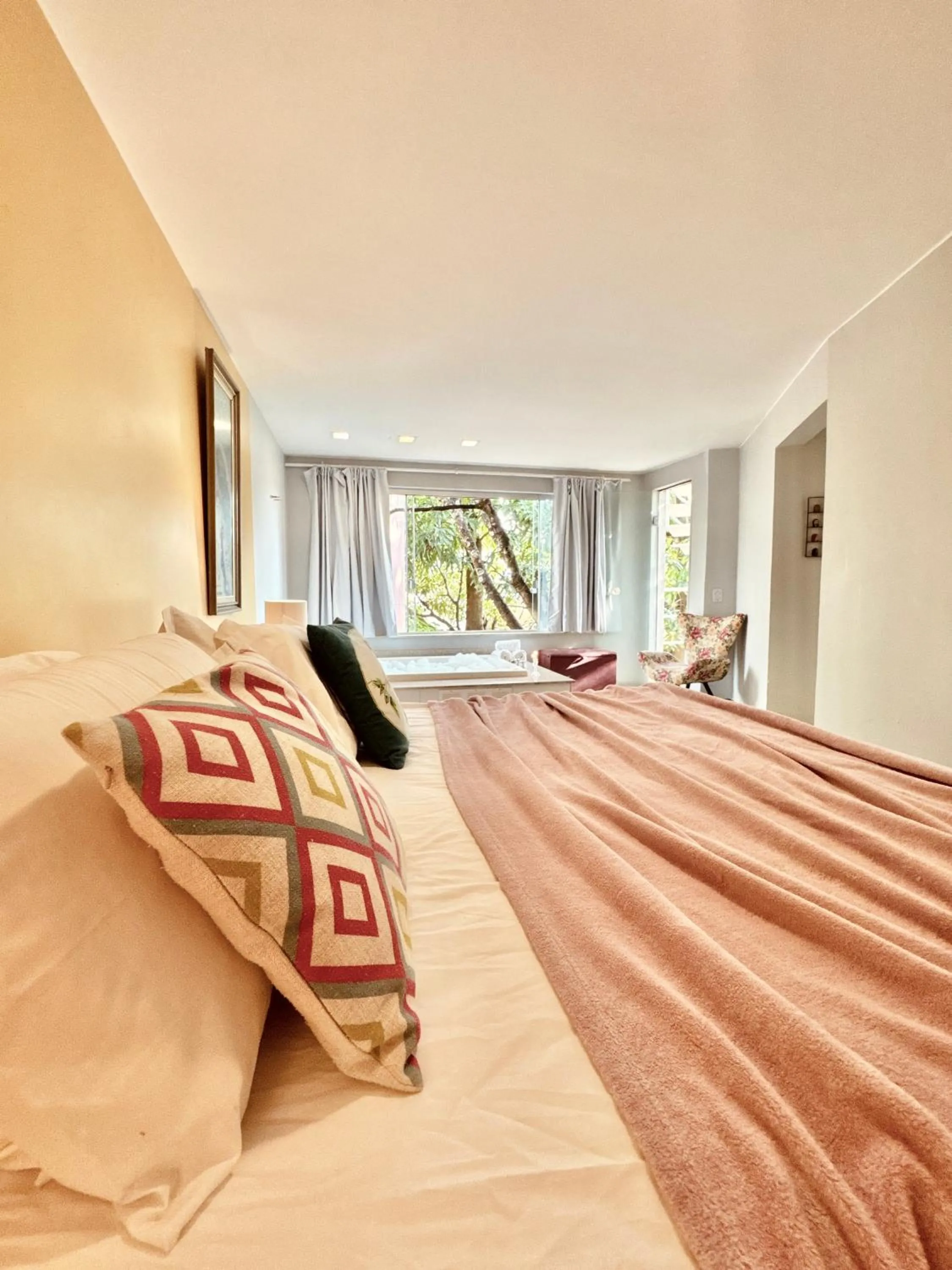 Bed in Pousada Casa das Flores