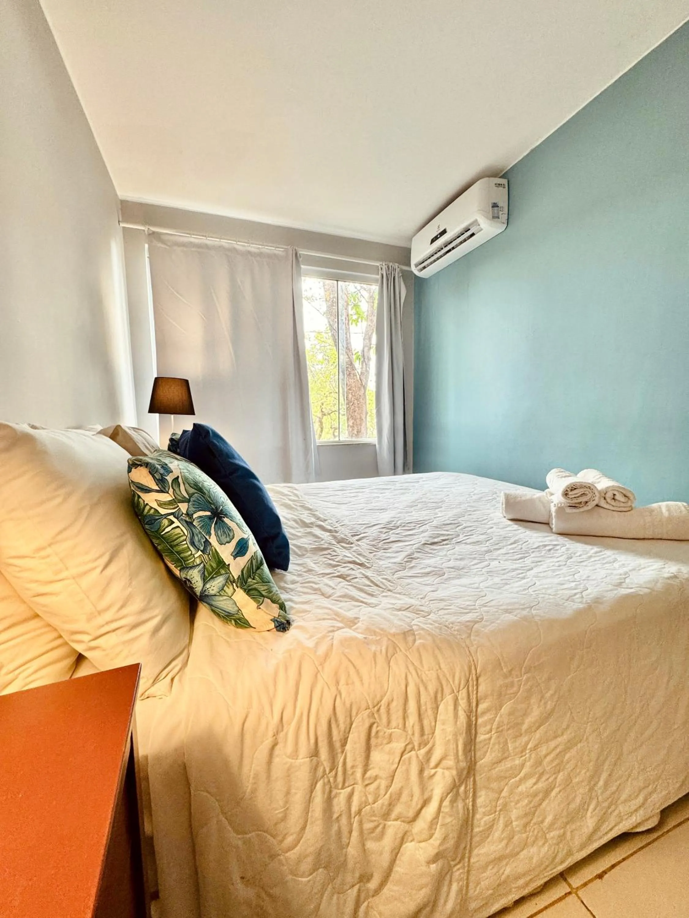 Bed in Pousada Casa das Flores