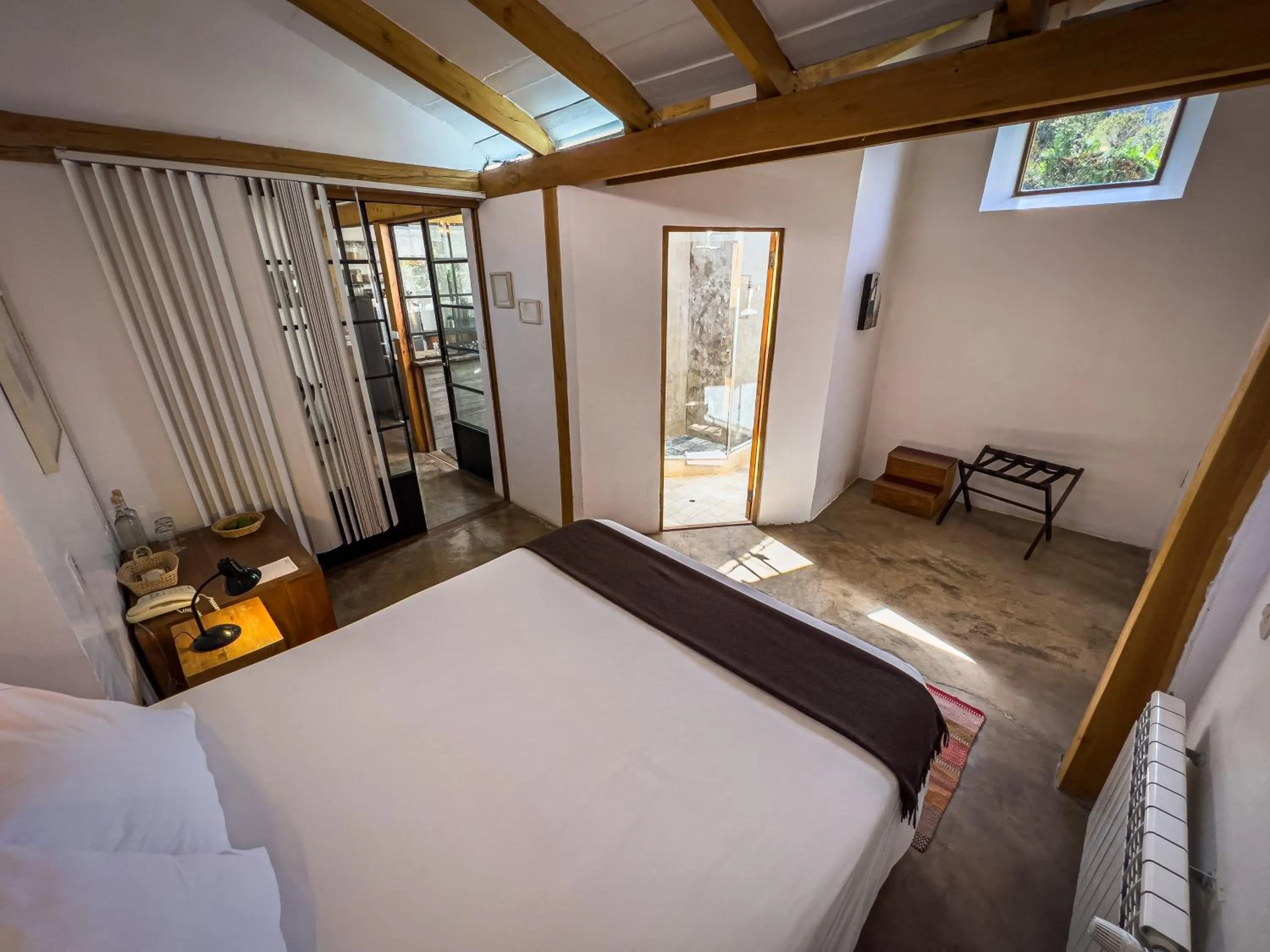 Photo of the whole room, Bed in El Albergue Ollantaytambo