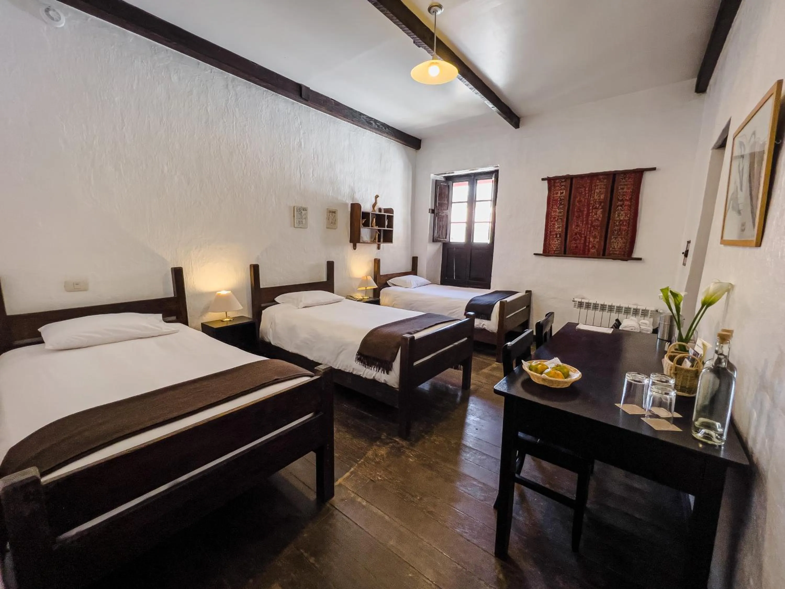 Standard Triple Room in El Albergue Ollantaytambo