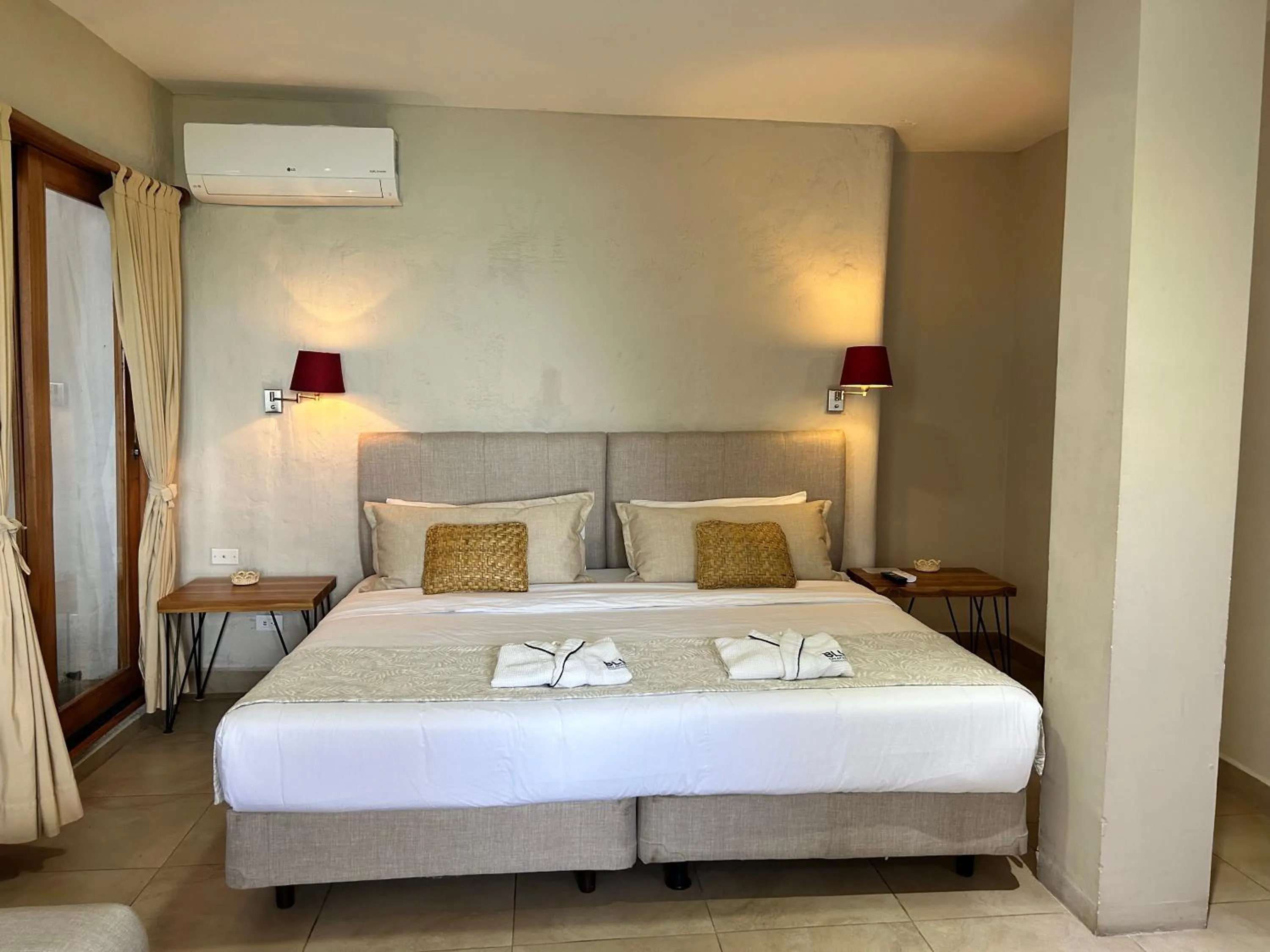 Bed in Blu Galapagos Sustainable Waterfront Lodge