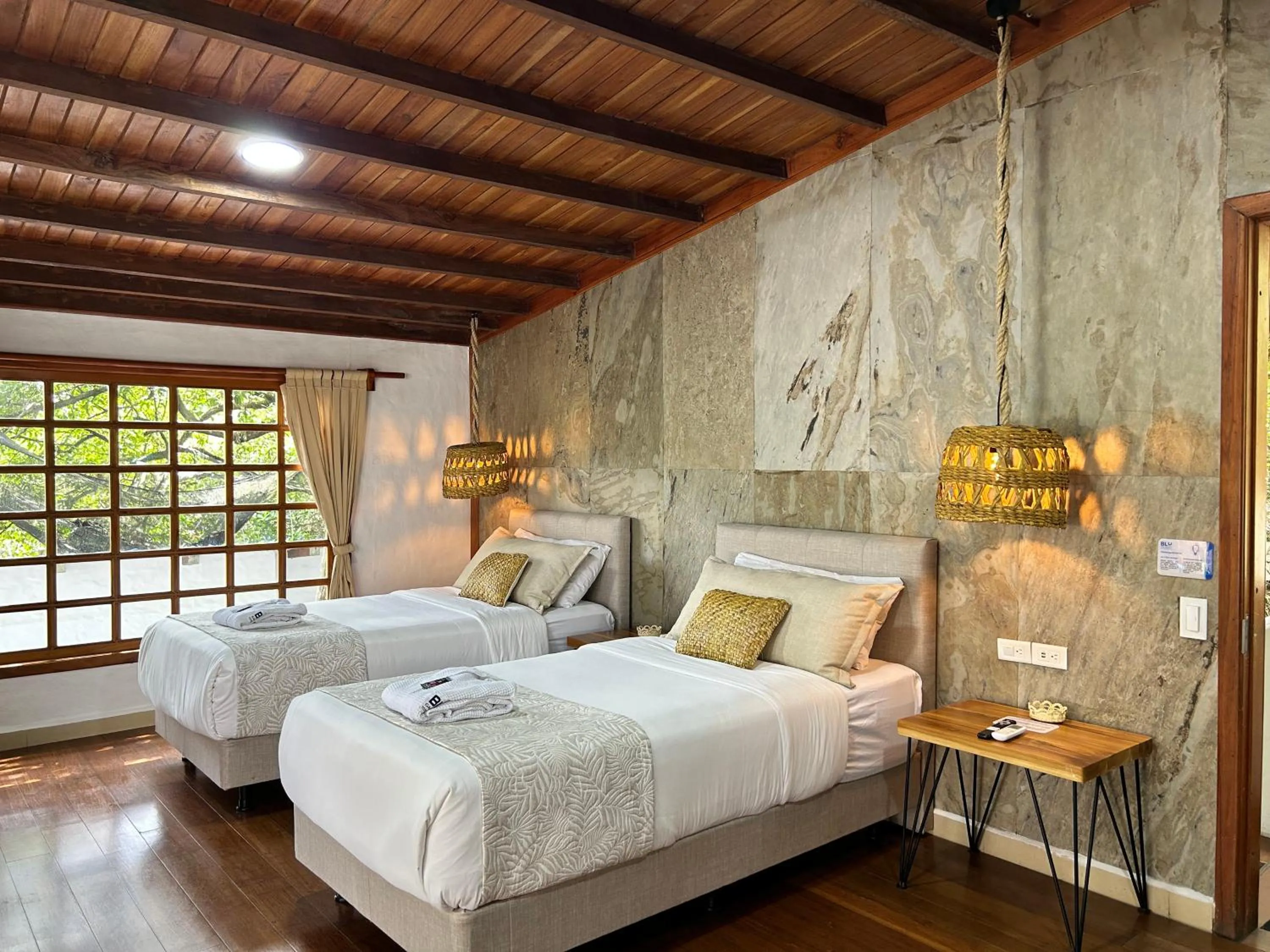 Bedroom, Bed in Blu Galapagos Sustainable Waterfront Lodge