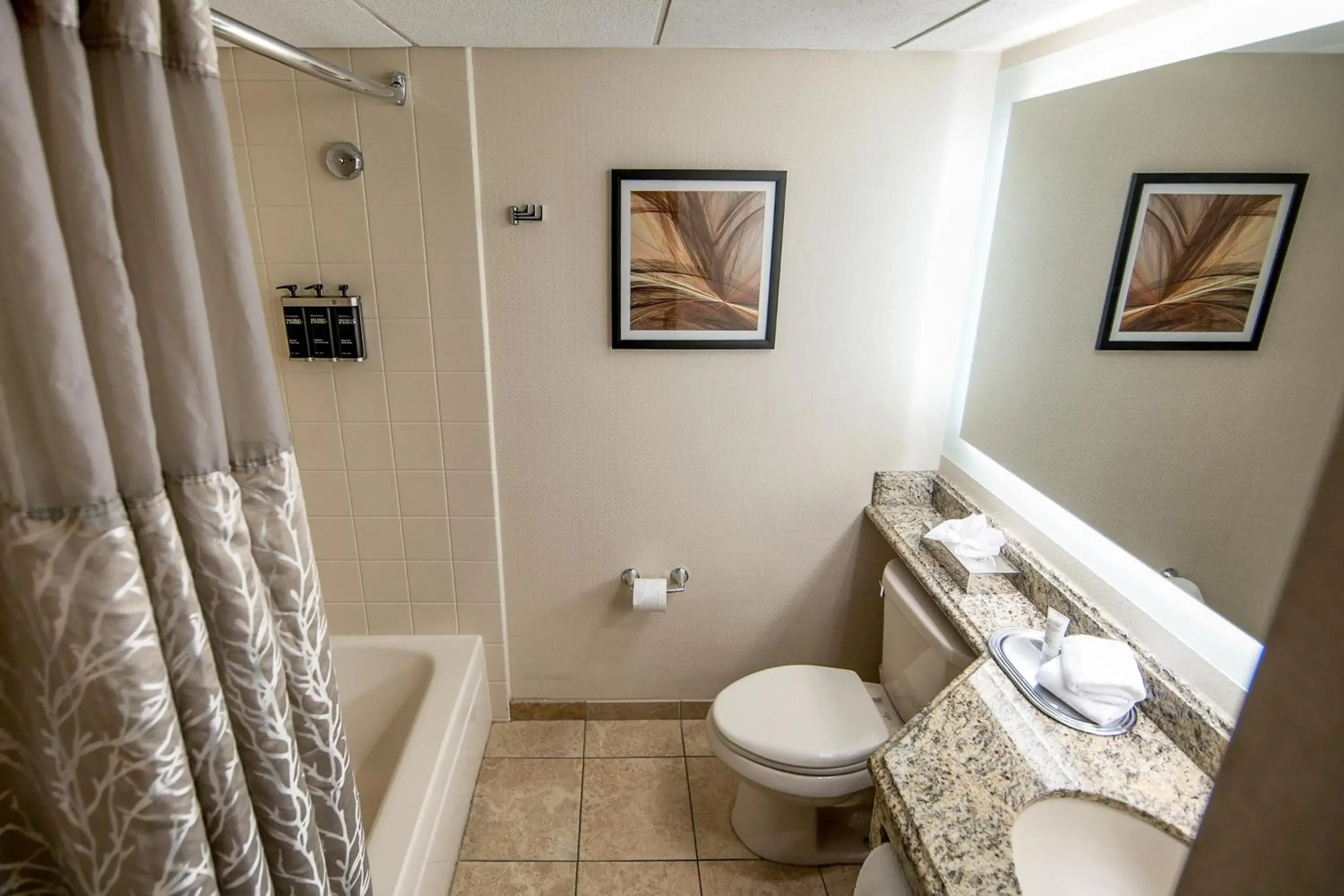 Bathroom in Eden Resort and Suites, BW Premier Collection Bathroom in Eden Resort and Suites, BW Premier Collection