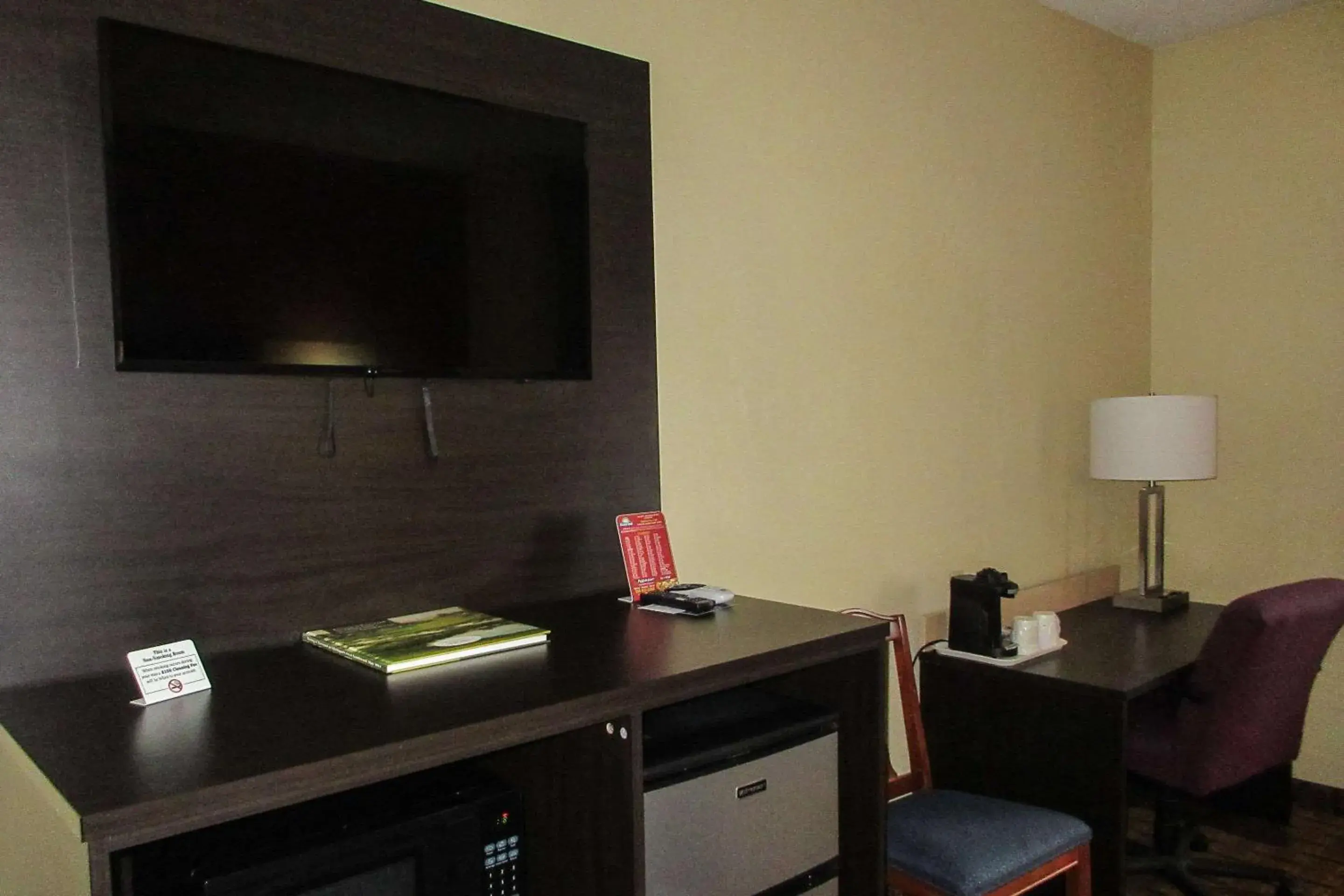 Photo of the whole room, TV/Entertainment Center in Quality Inn & Suites