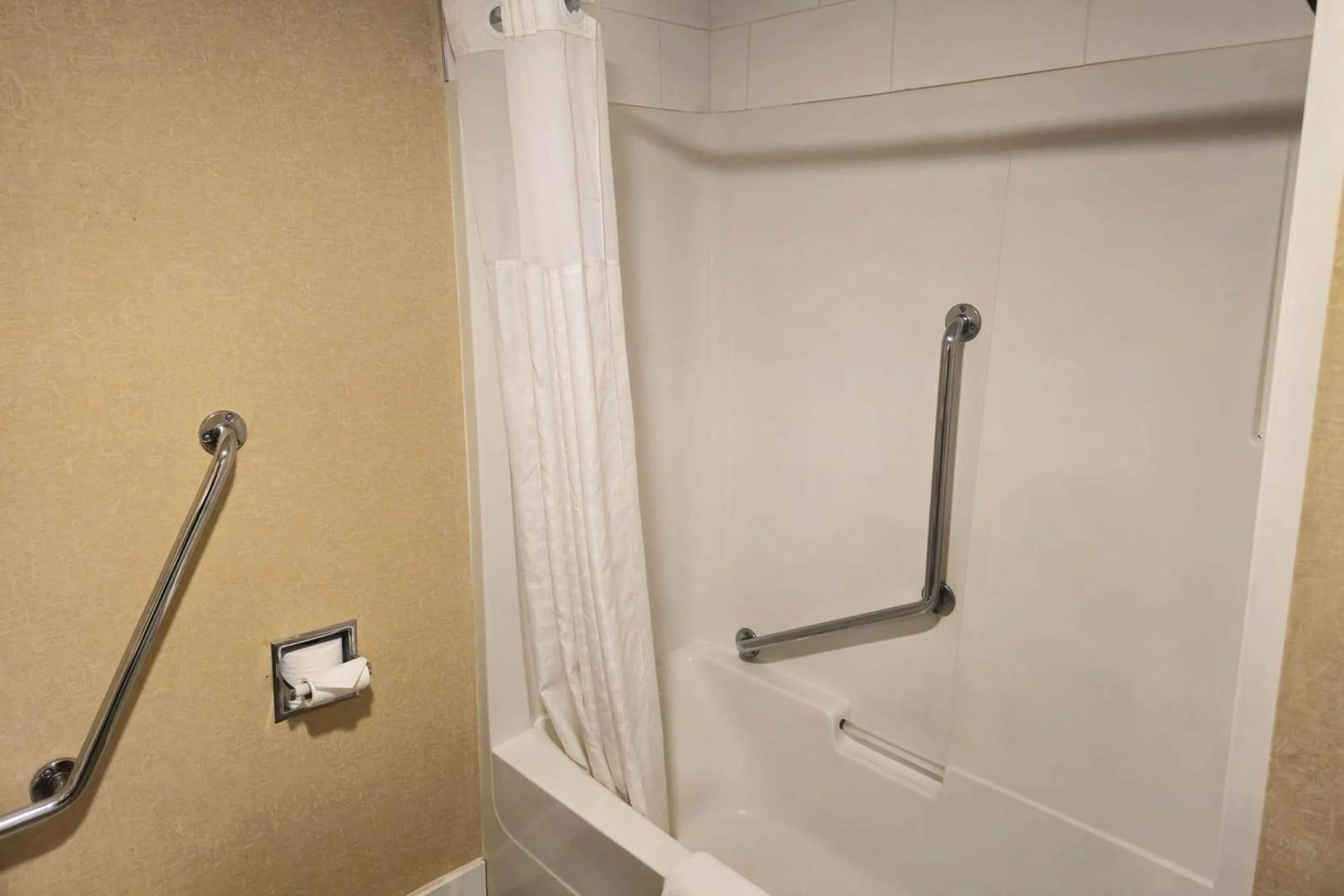 Bedroom in Rodeway Inn & Suites