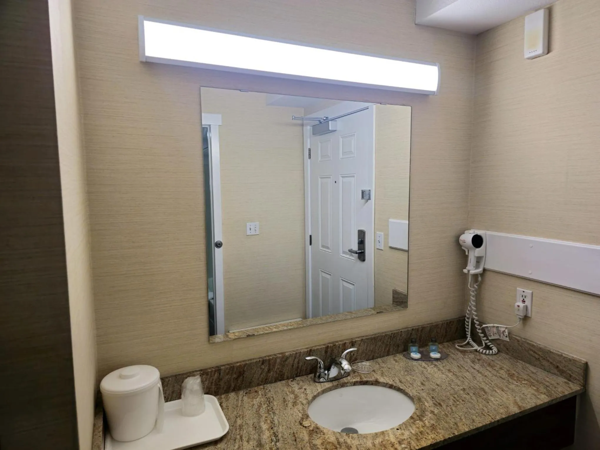 Shower in Rodeway Inn & Suites