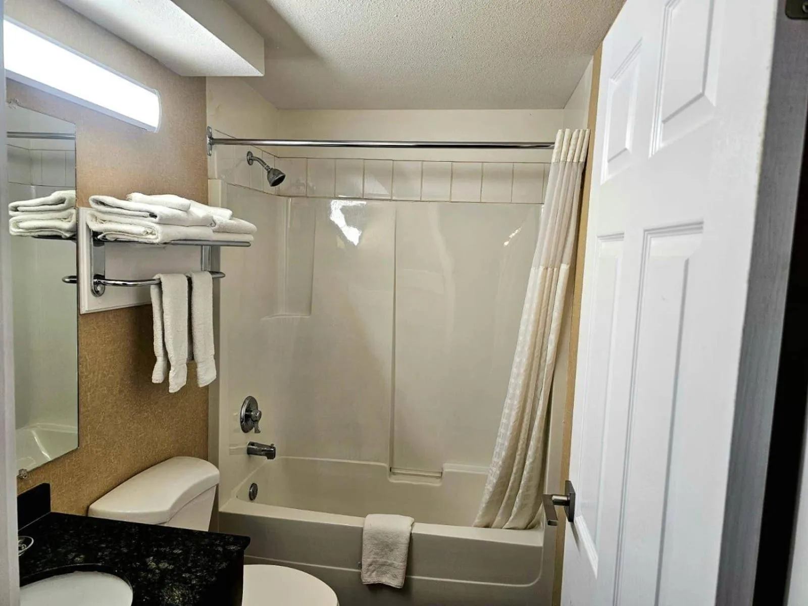 Bedroom in Rodeway Inn & Suites