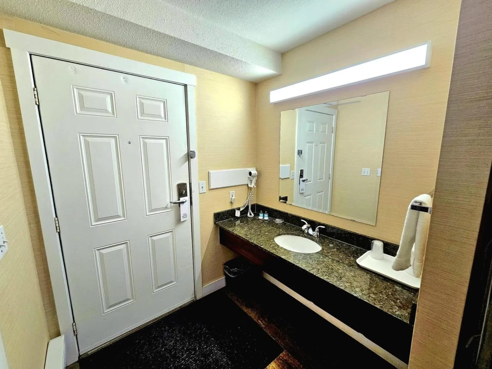 Shower in Rodeway Inn & Suites