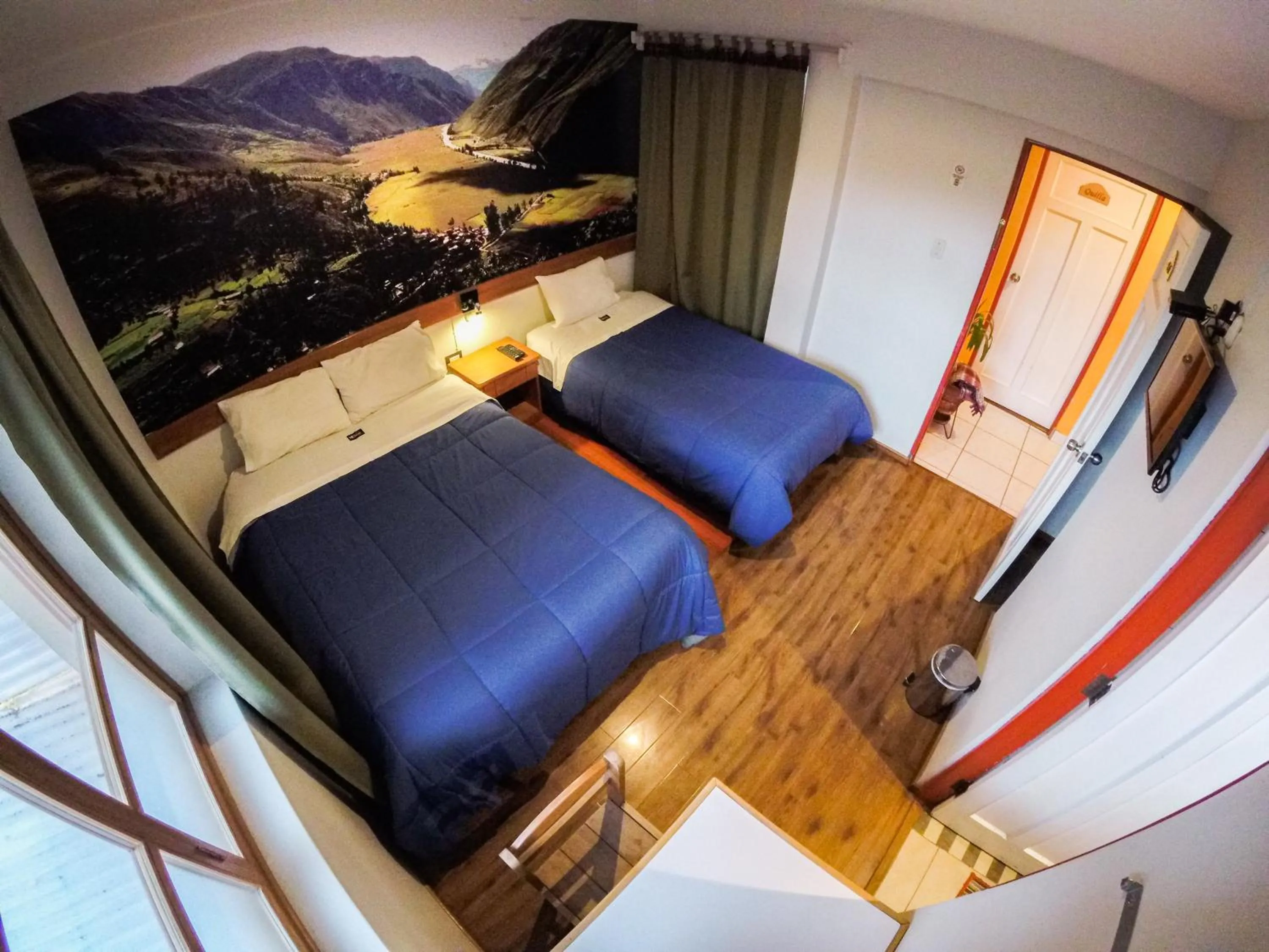 Photo of the whole room, Bed in Net House Cusco