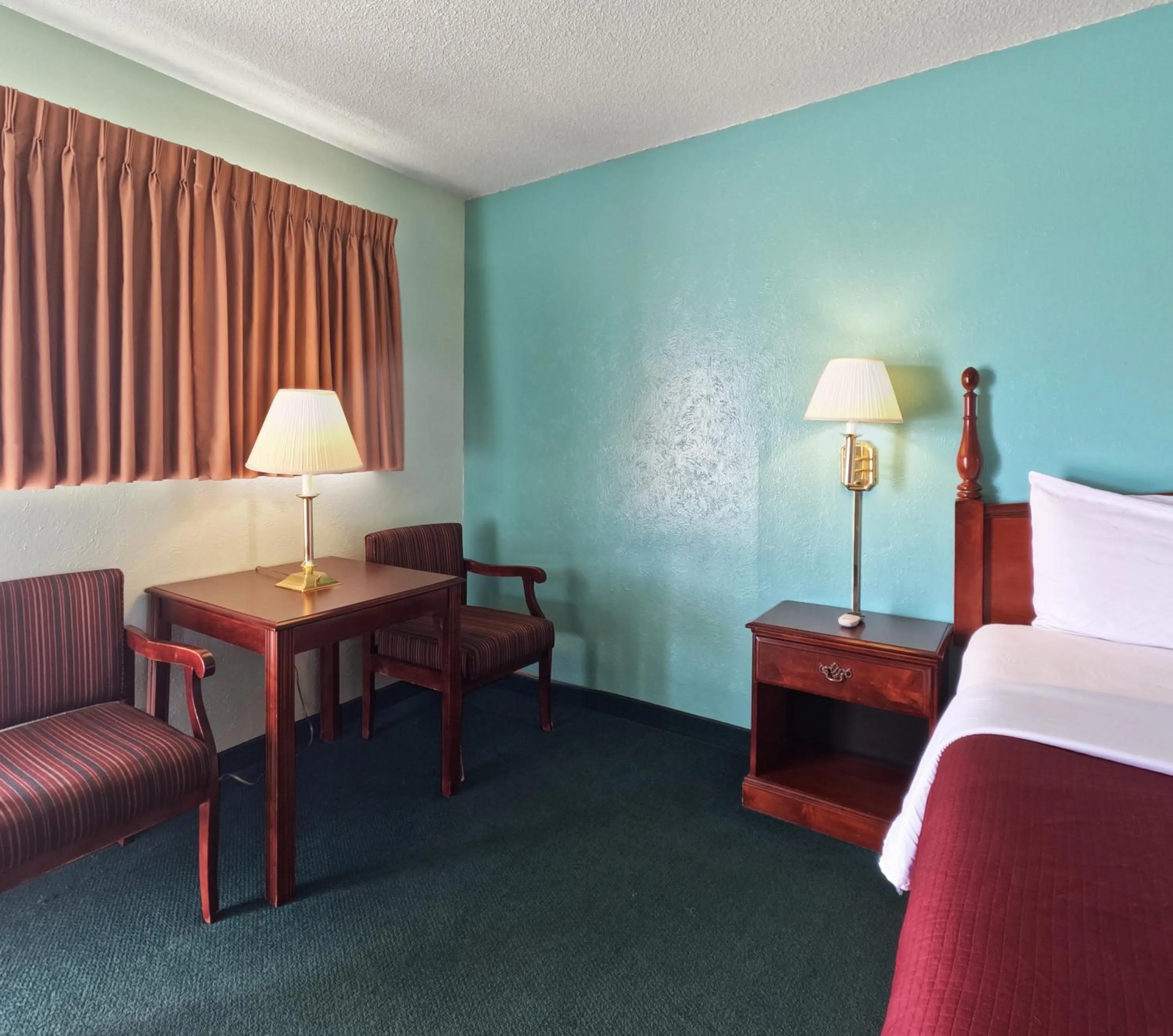 Bed in Americas Best Value Inn & Suites Vega