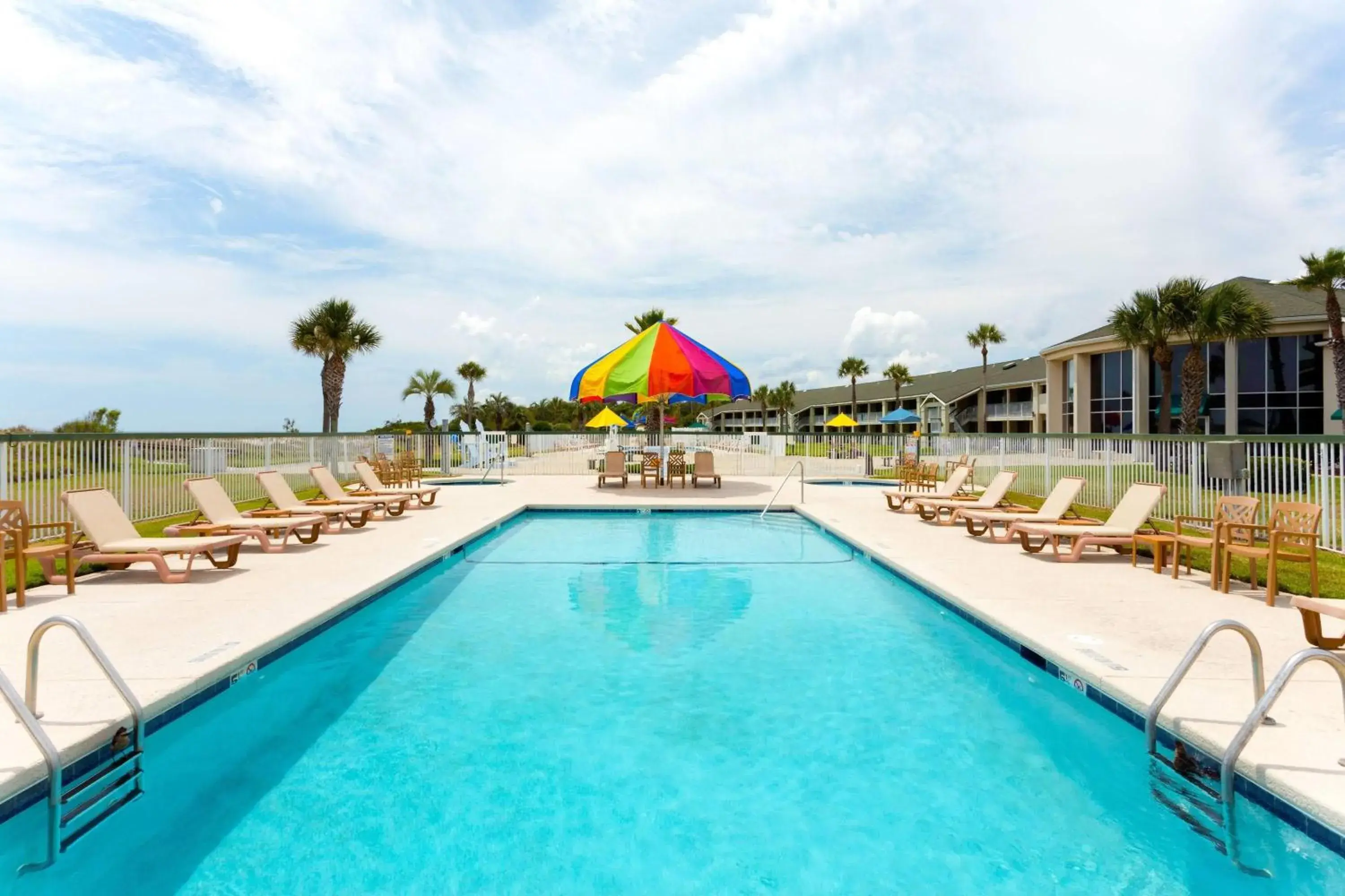 Pool view in Days Inn & Suites by Wyndham Jekyll Island Pool view in Days Inn & Suites by Wyndham Jekyll Island