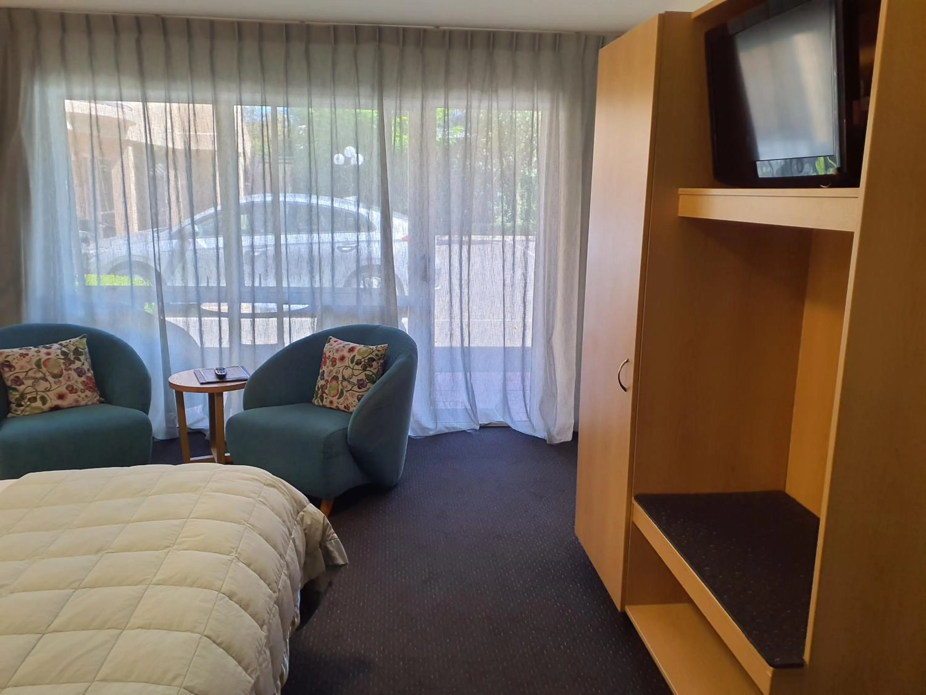 Bed in Tuscana Motor Lodge