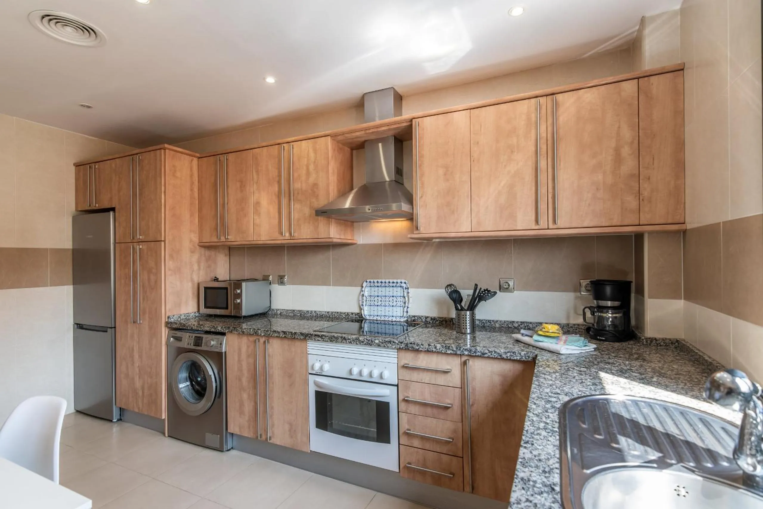 Kitchen or kitchenette in Playa Marina by Ĥ - EXCELLENCE- Playa Punta del Moral PPHM201P124P125