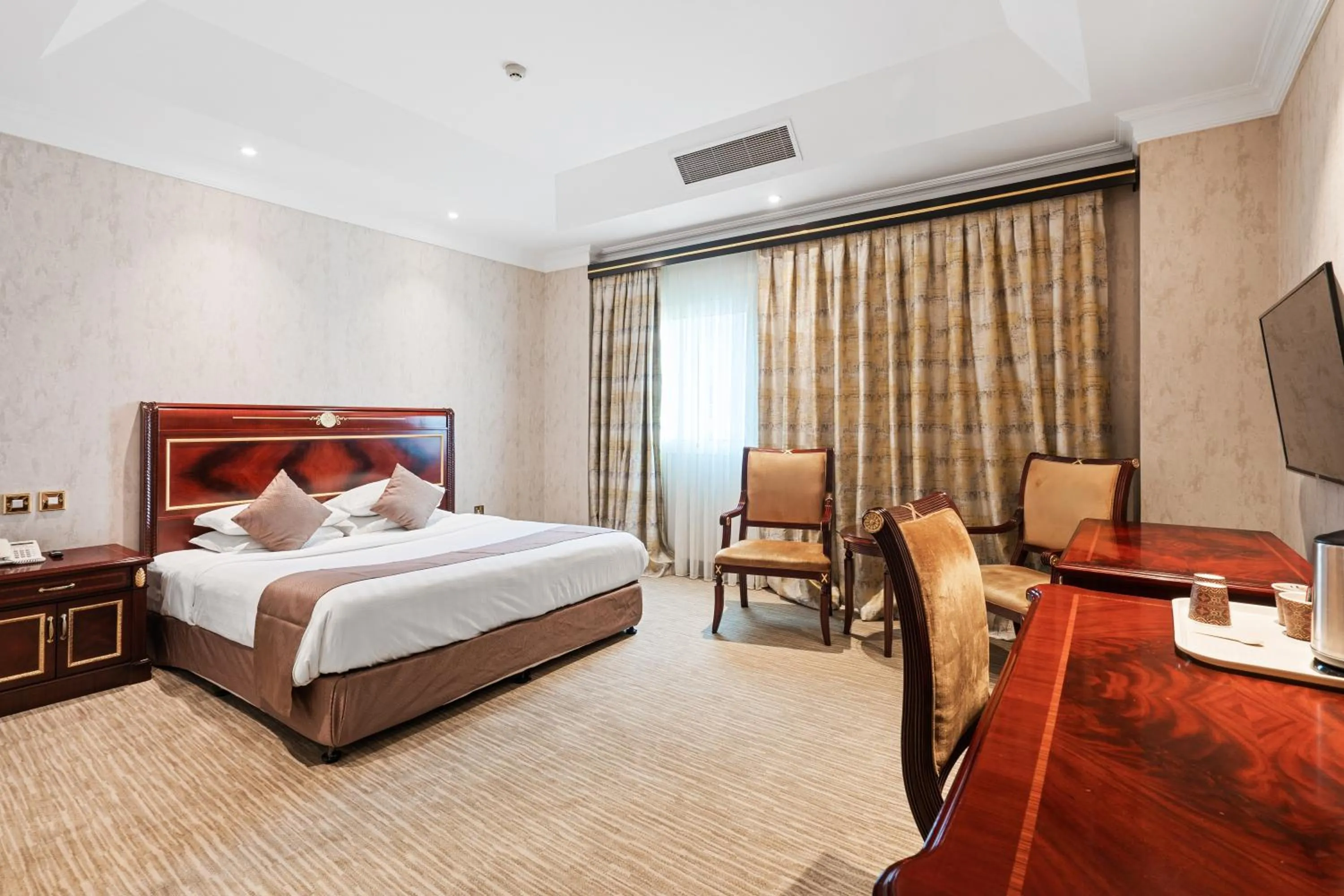 Bed in Chairmen Hotel