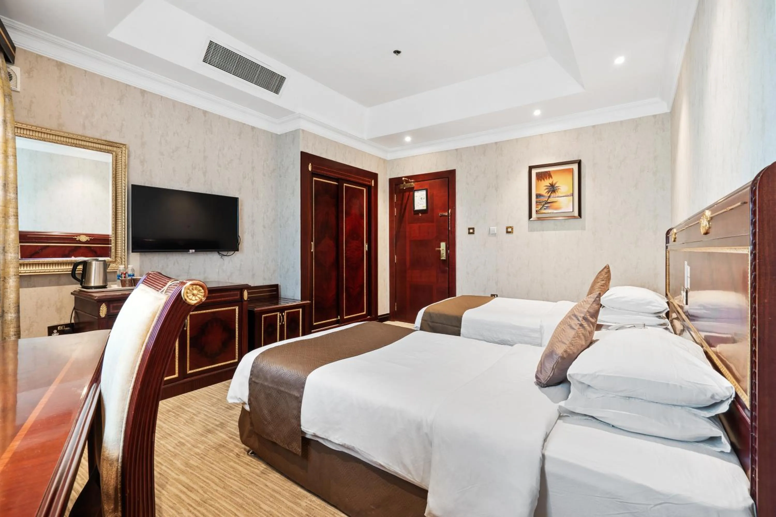 Bed in Chairmen Hotel