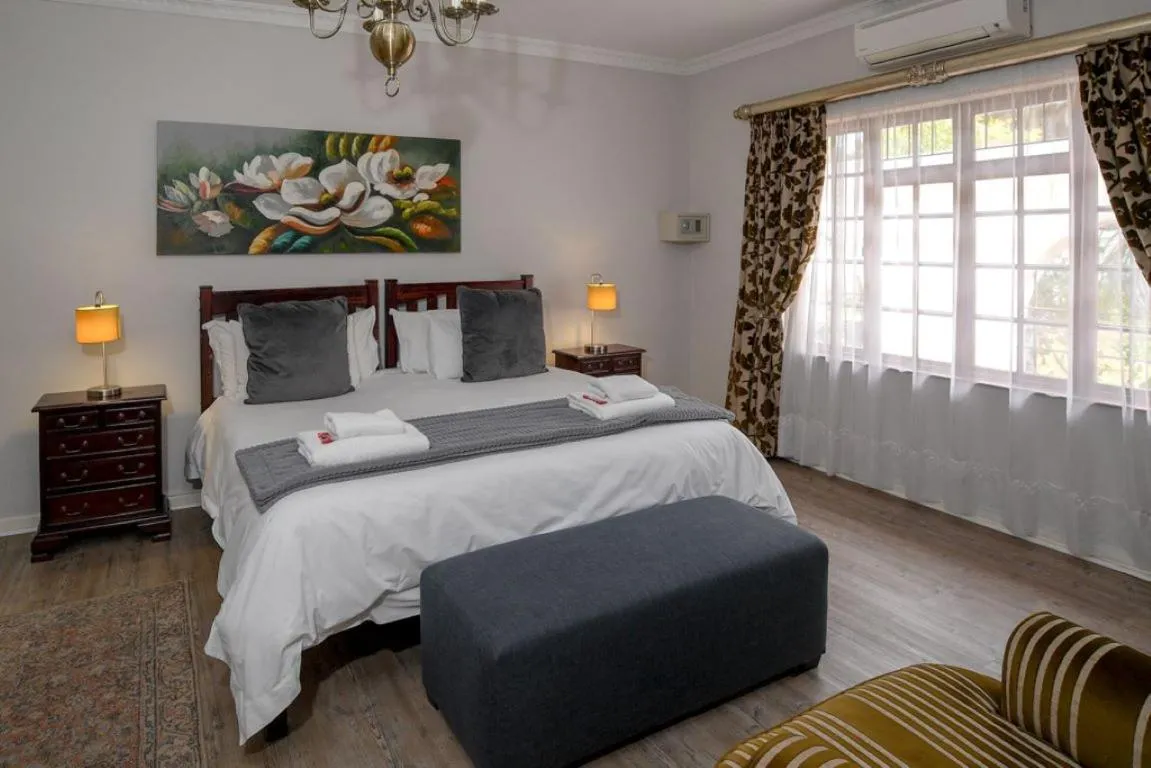Bed in Dark Chocolate Guest House