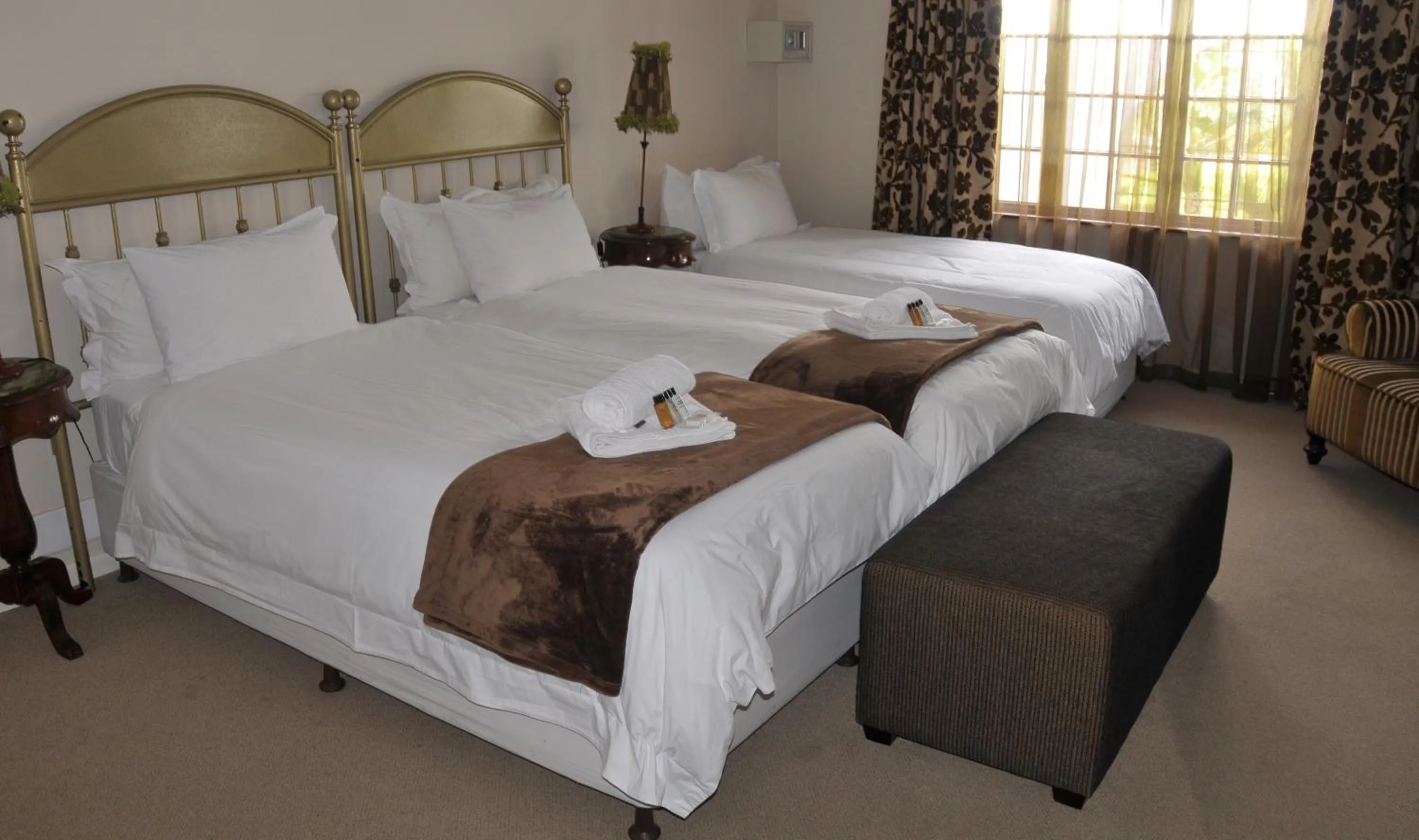Bed in Dark Chocolate Guest House