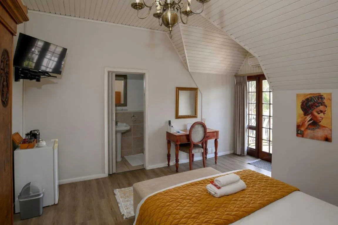 Bed in Dark Chocolate Guest House