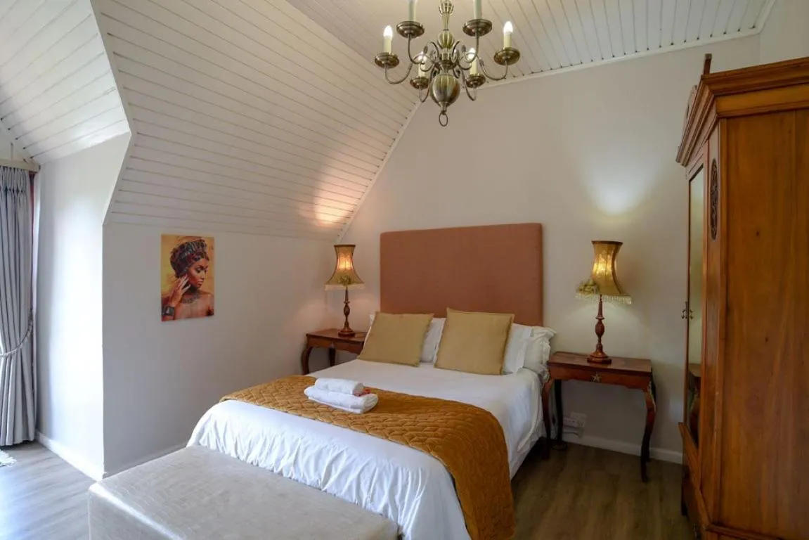 Bed in Dark Chocolate Guest House