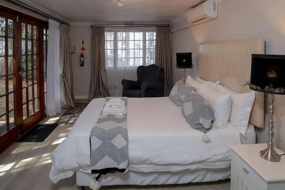 Bed in Dark Chocolate Guest House