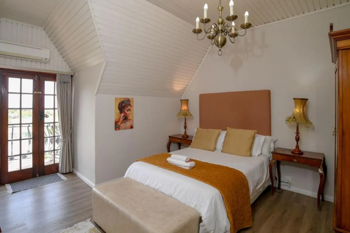 Bed in Dark Chocolate Guest House
