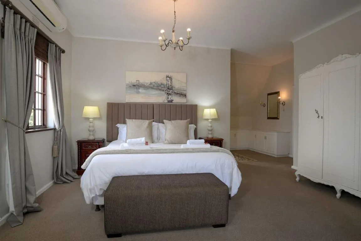 Bed in Dark Chocolate Guest House