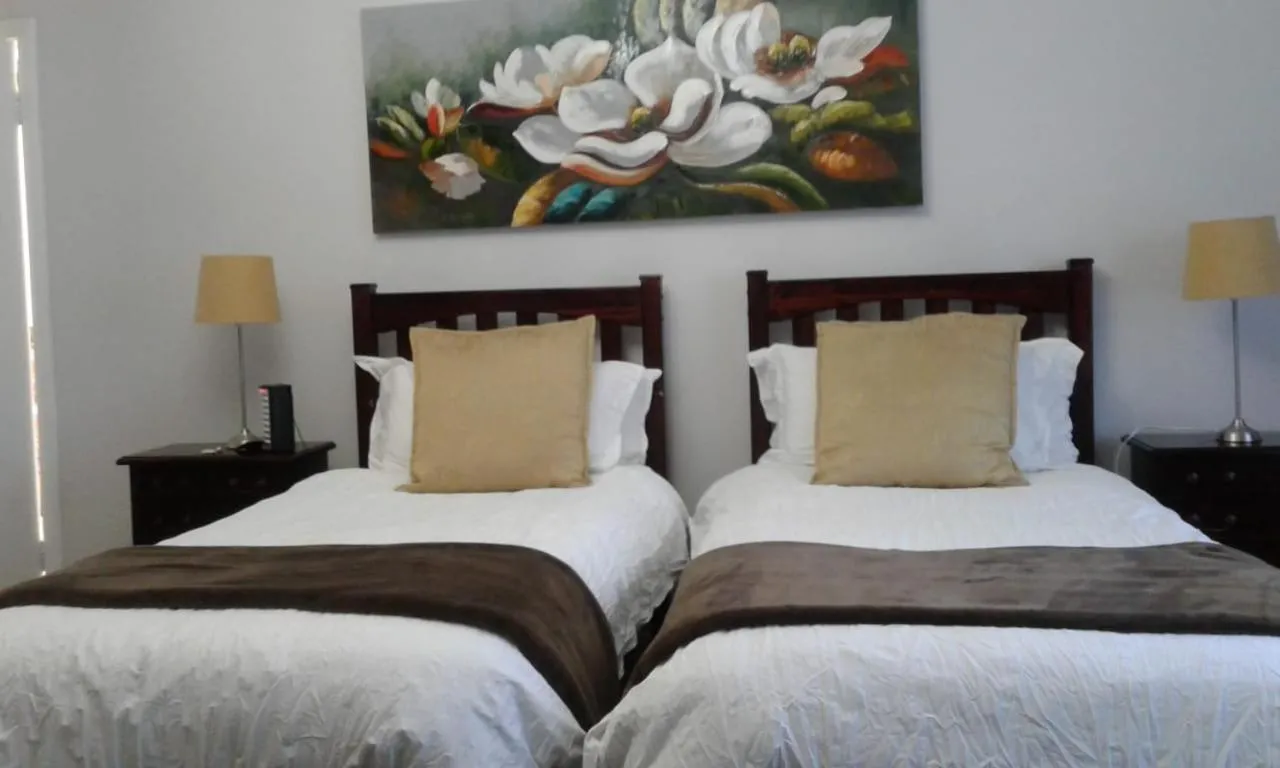 Bed in Dark Chocolate Guest House