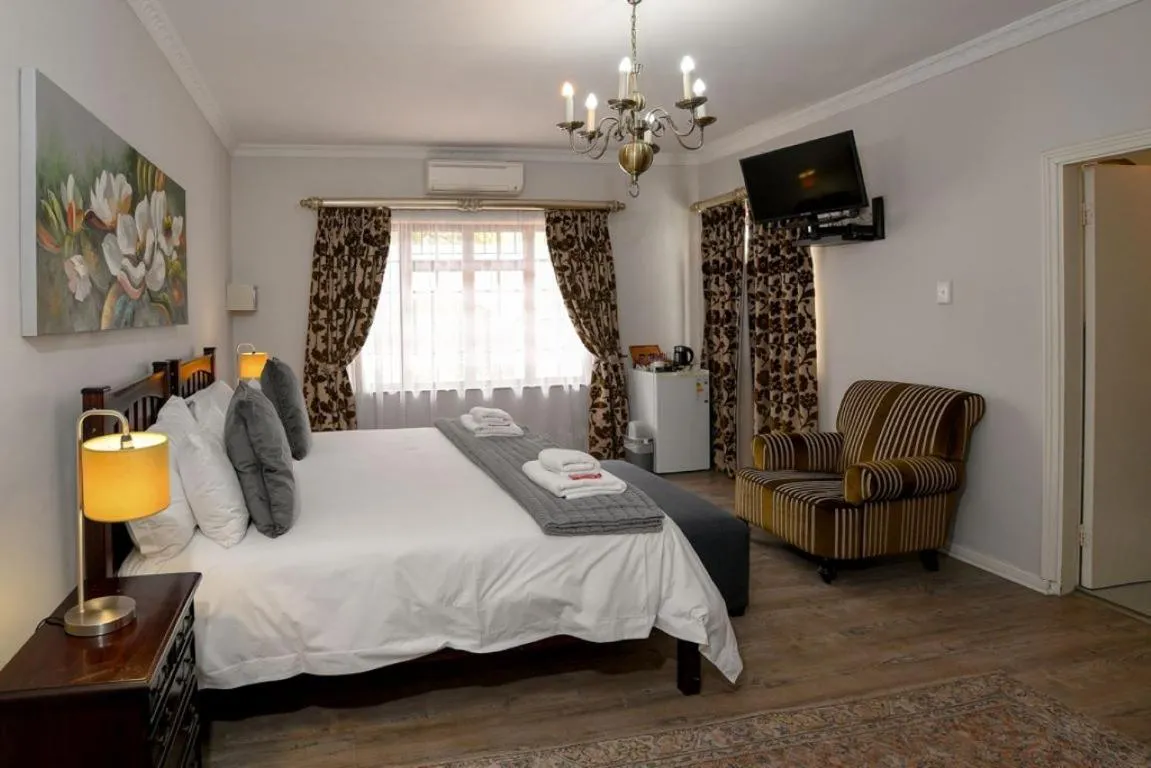 Bed in Dark Chocolate Guest House