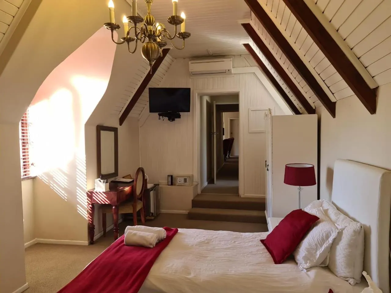 Bed in Dark Chocolate Guest House