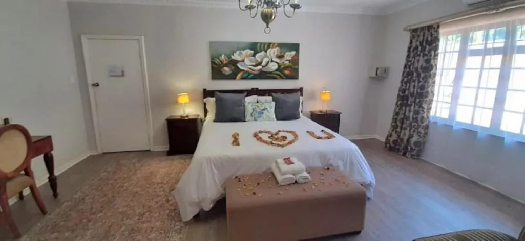 Bed in Dark Chocolate Guest House