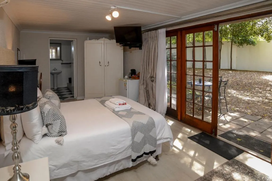 Bed in Dark Chocolate Guest House