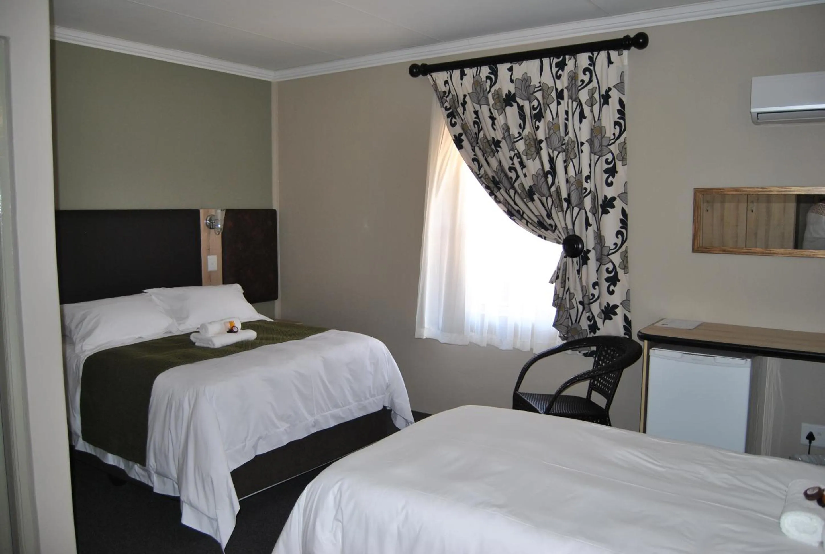 Bedroom in Be My Guest Hotel Conference