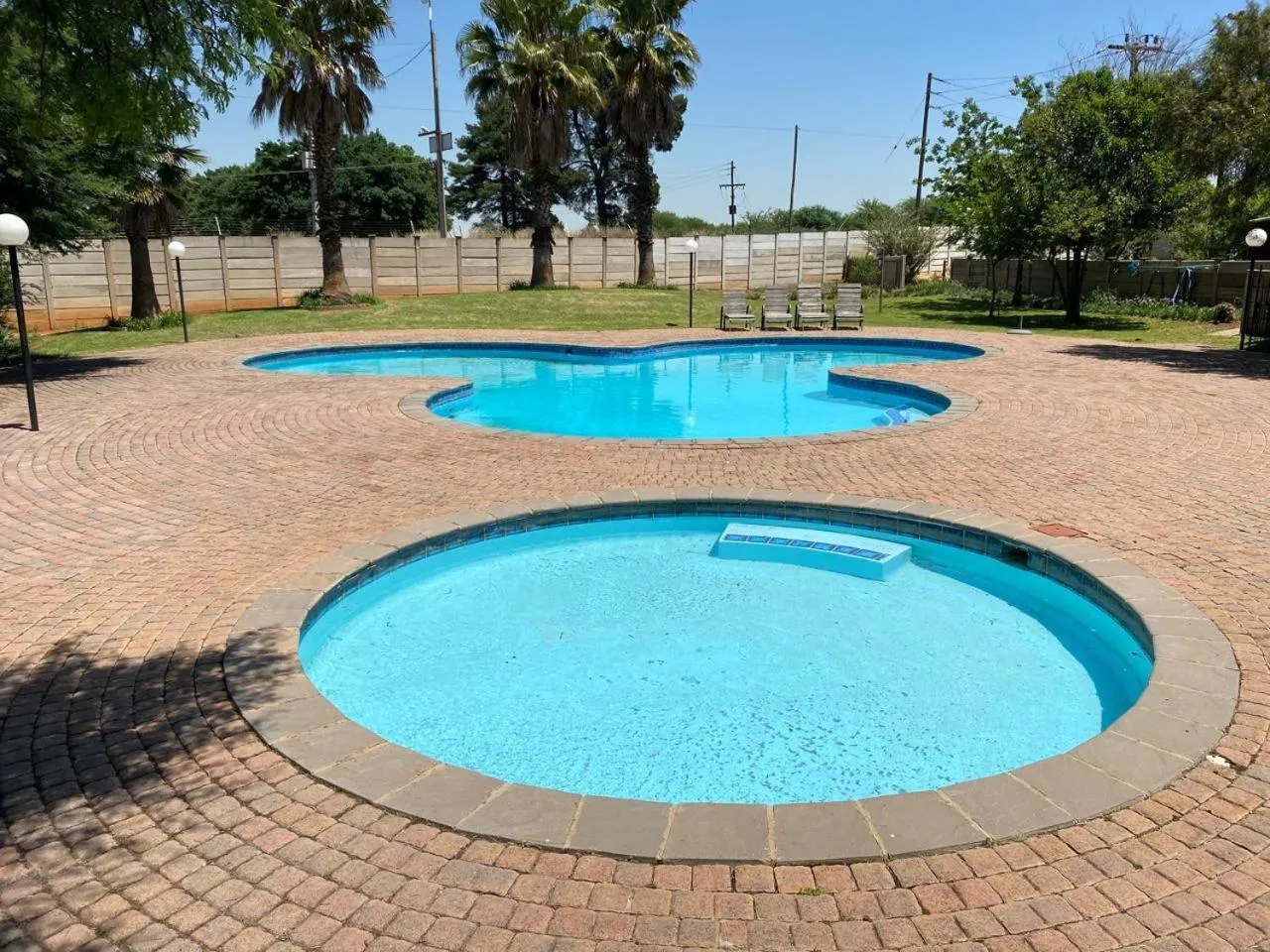 Swimming pool in Be My Guest Hotel Conference