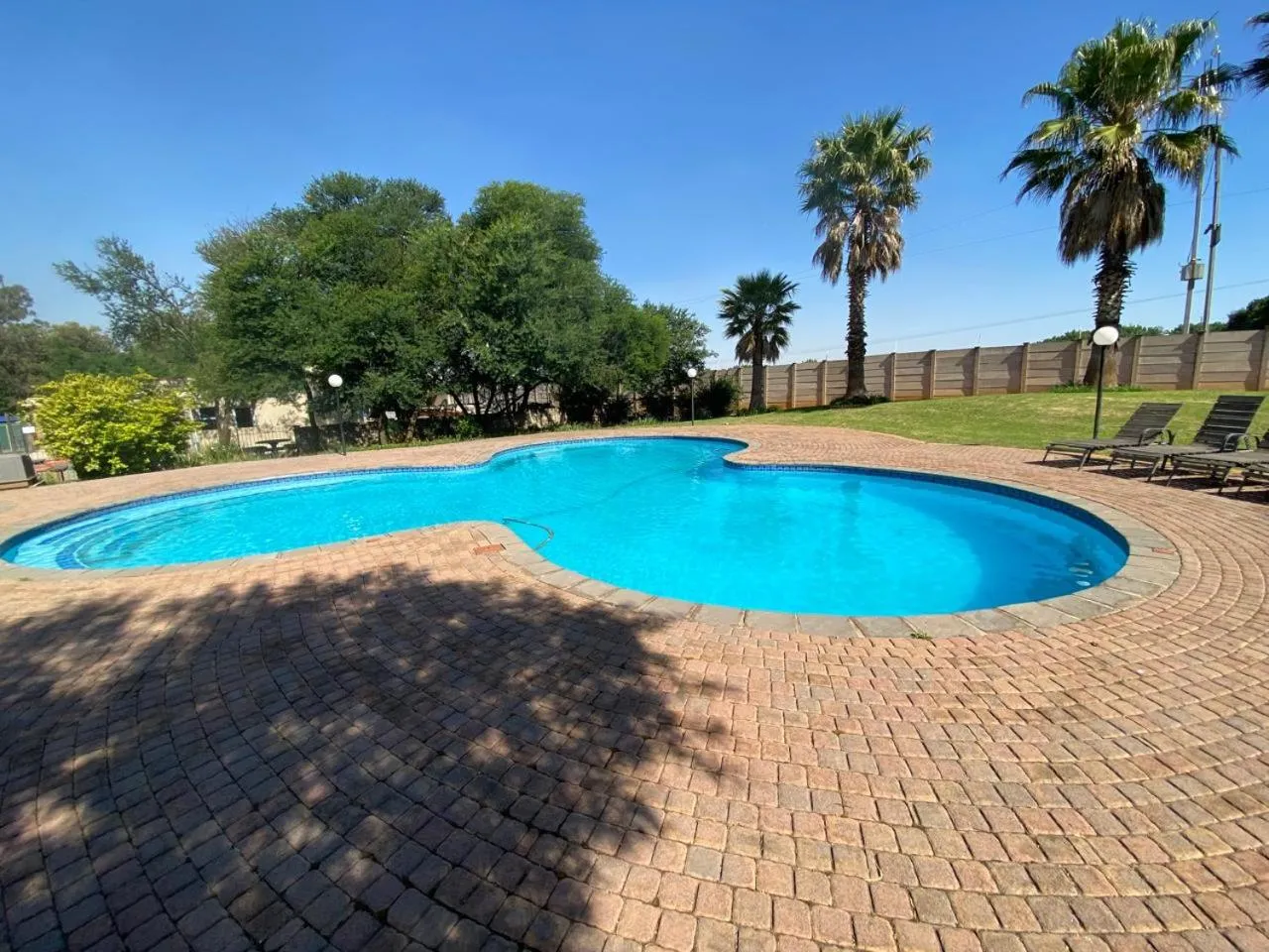 Swimming pool in Be My Guest Hotel Conference