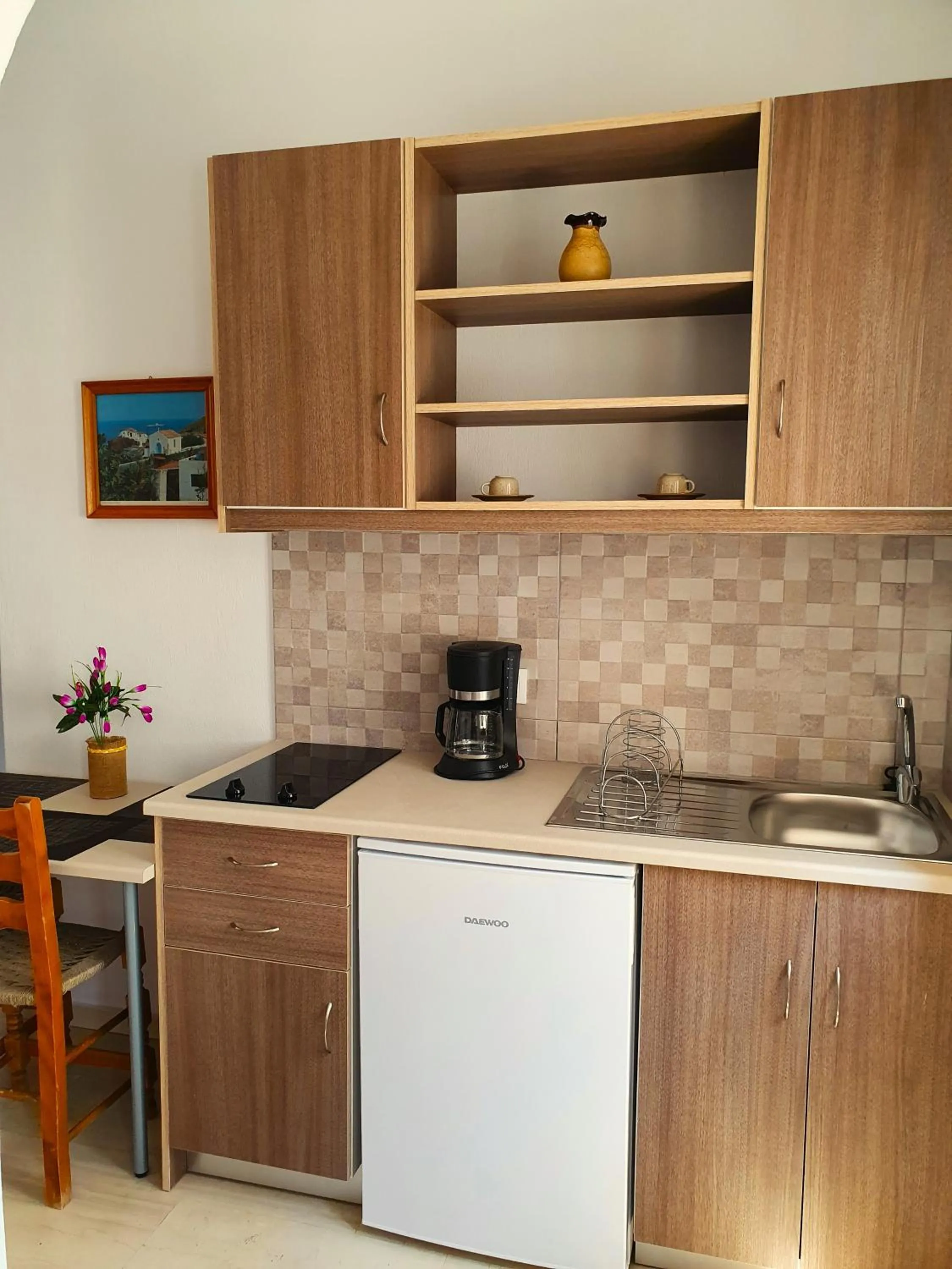 Kitchen or kitchenette in Nina Apartments