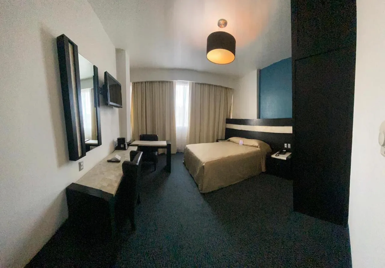 Bed in Hotel Real Rex