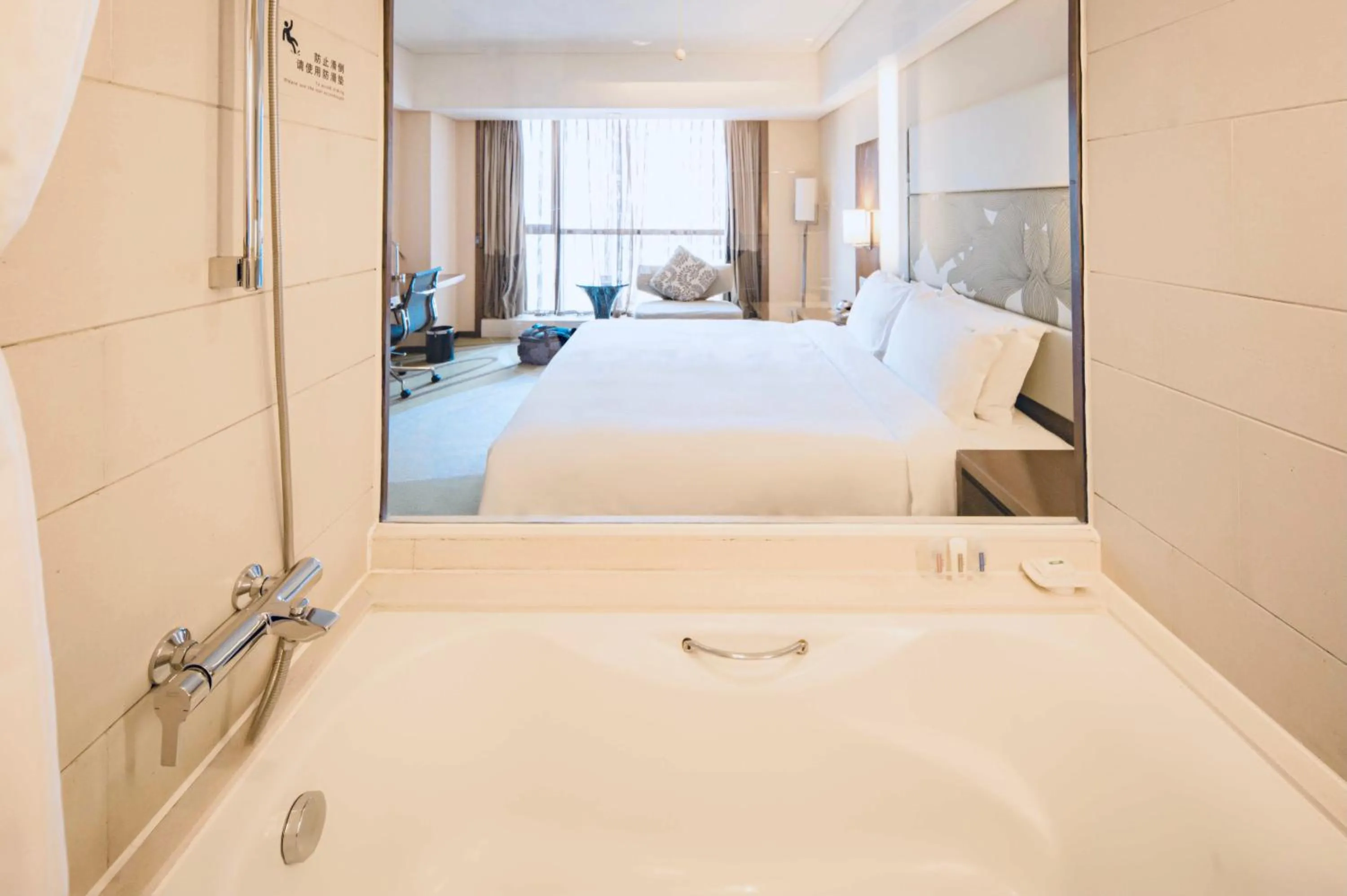 Bathroom, Bed in Holiday Inn Qingdao City Center by IHG - May 4th Square