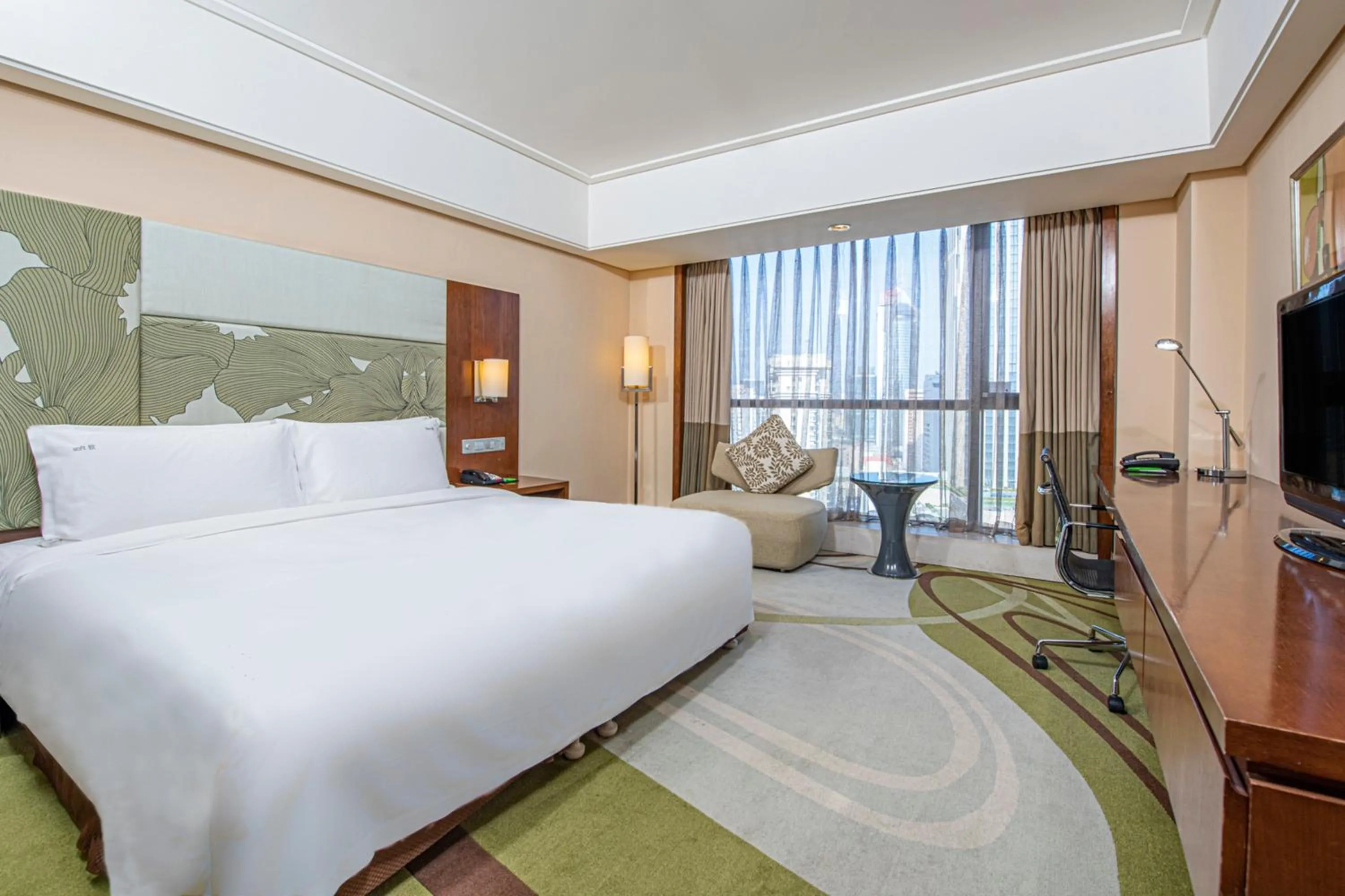 Photo of the whole room, Bed in Holiday Inn Qingdao City Center by IHG - May 4th Square