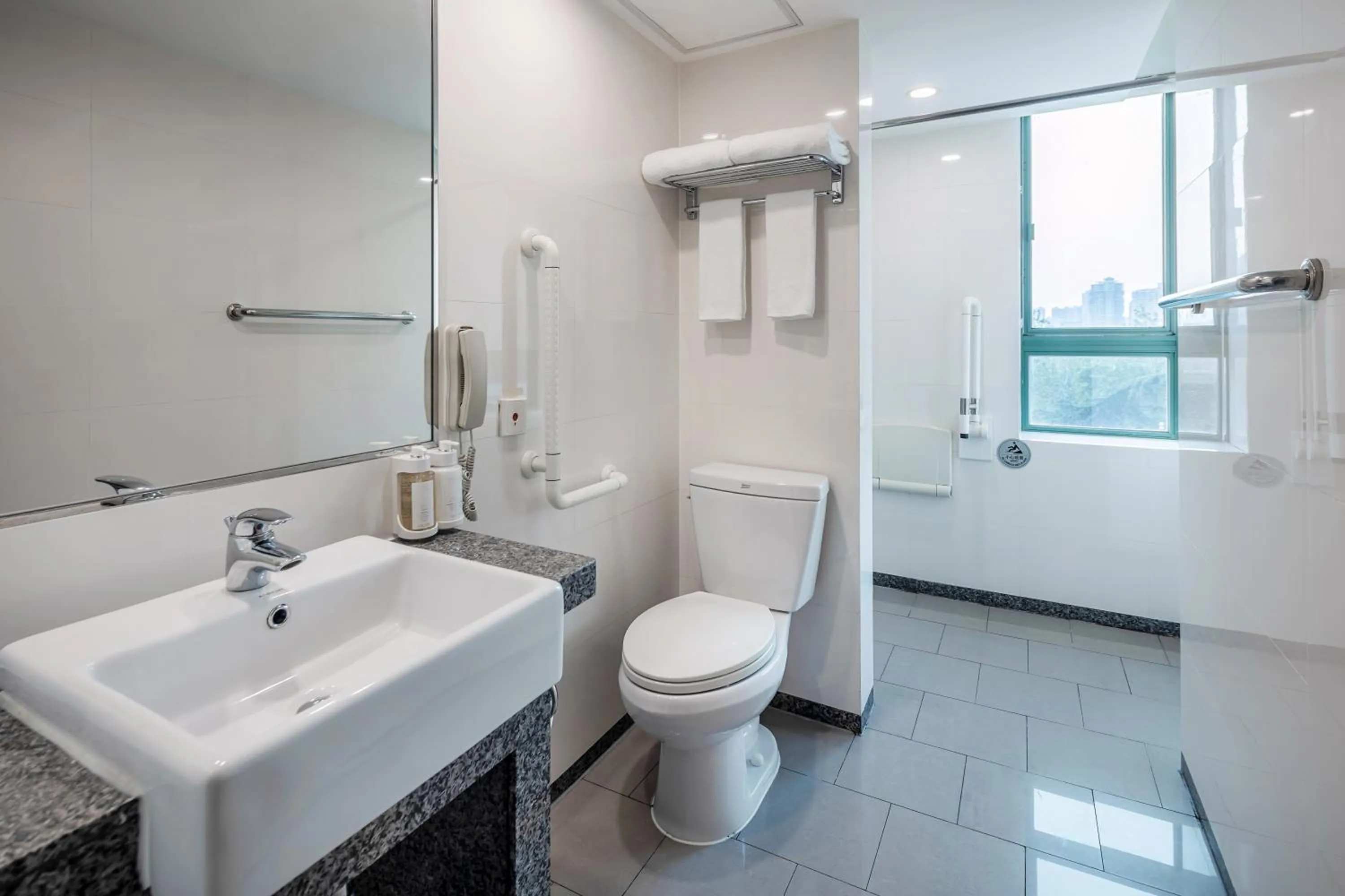 Toilet in Holiday Inn Wuhan Riverside by IHG